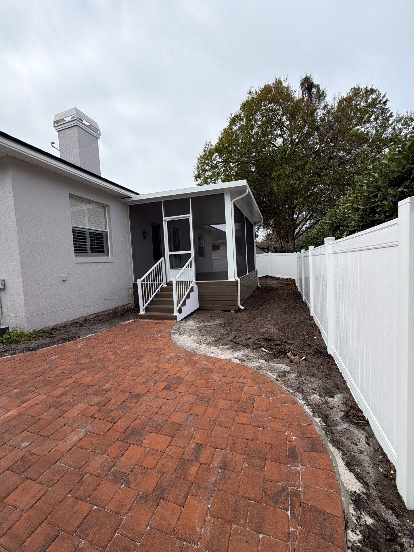 The Complete Backyard Retreat: Insulated Screen Room & Composite Deck by Orlando pergolas