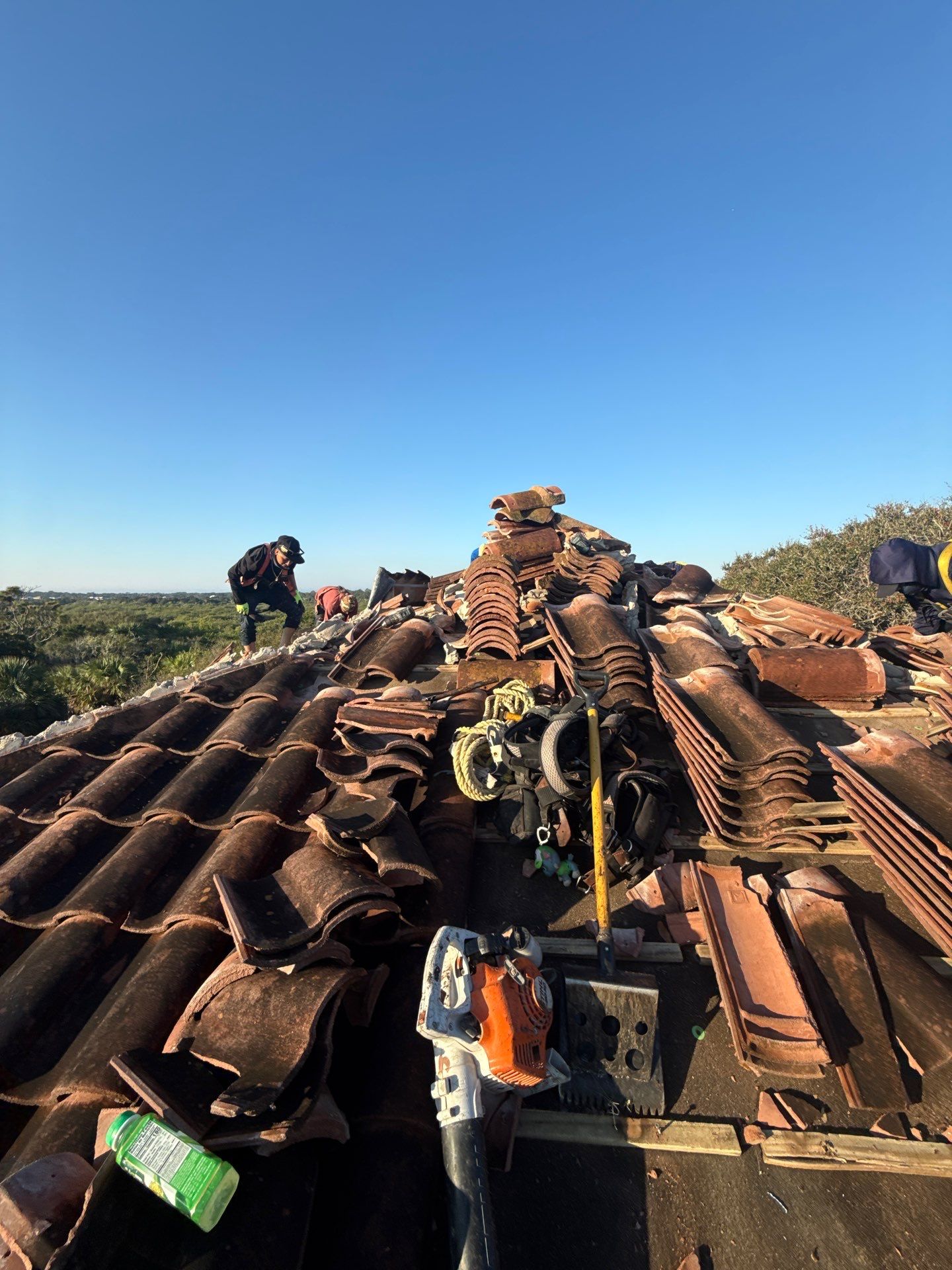Flagler Beach Residential Tile Roof Replacement with Dark Barrel Tiles by Fortified Roofing Solutions Corp.