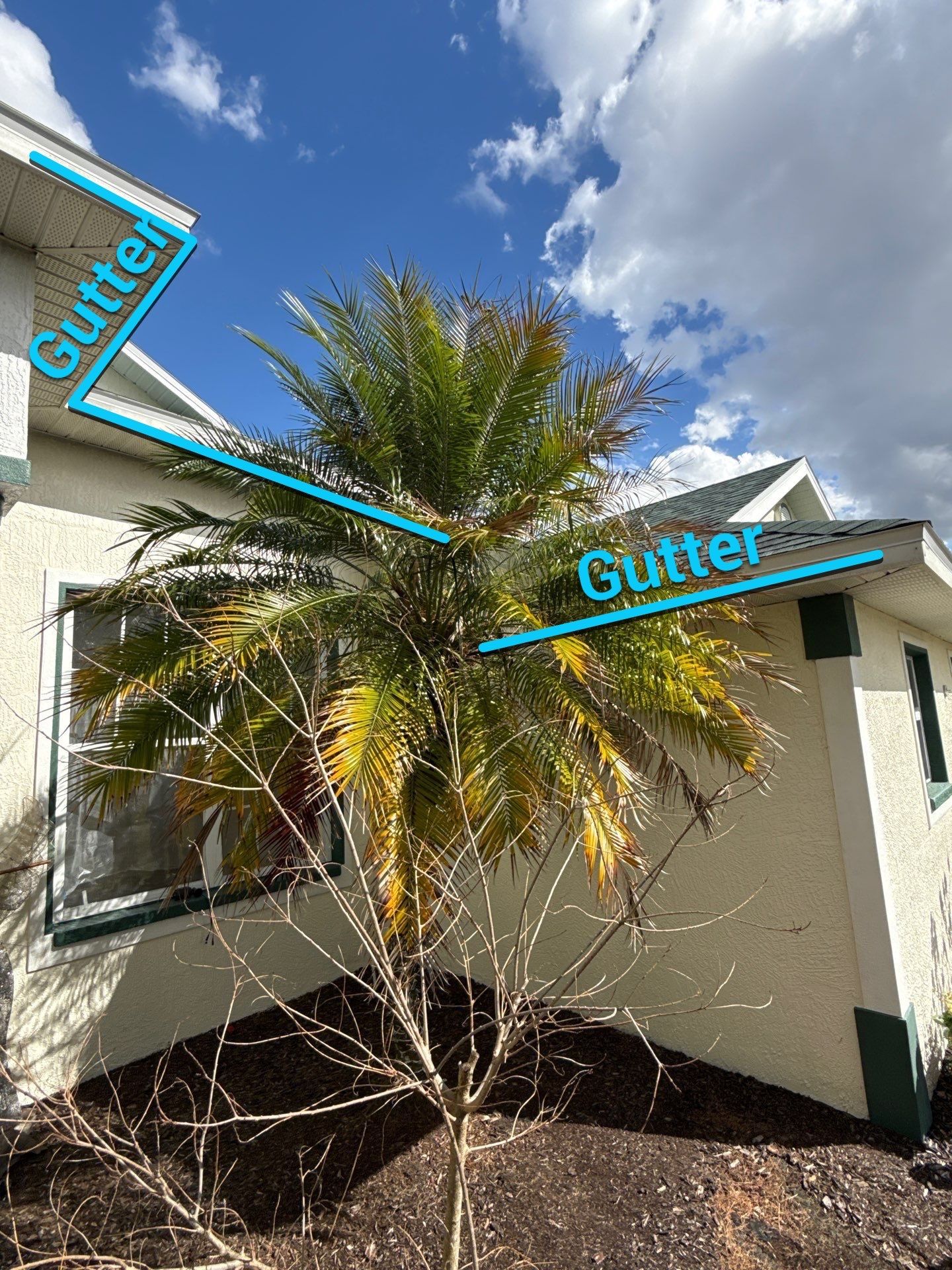 White seamless Gutters and downspout repair in Sarasota FL by Gutter Professors