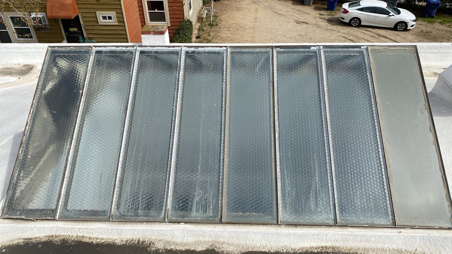 Polyurethane foam roof refurbish and recoating by Straight Edge Roofing Inc