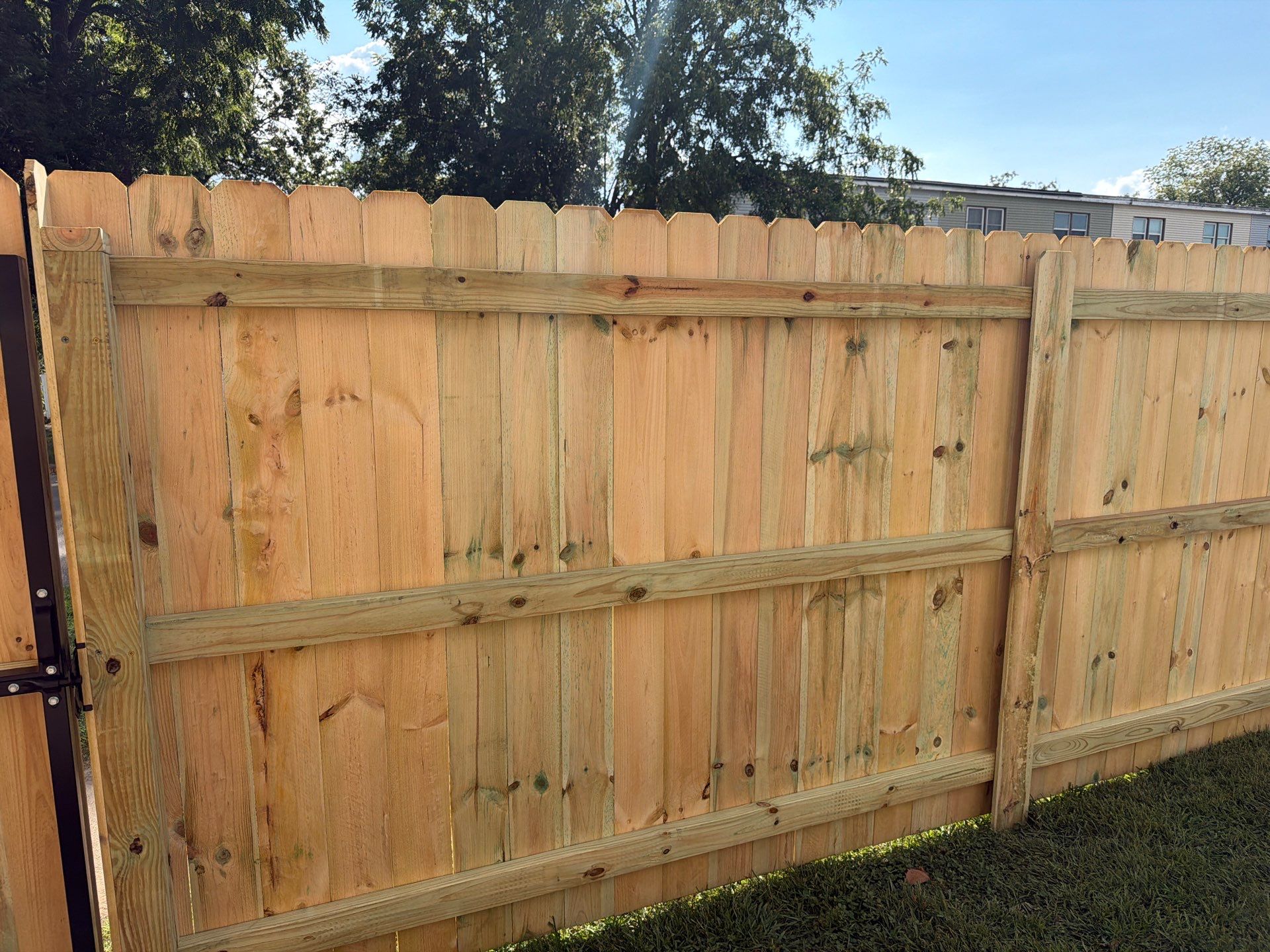 New Treated Wood Privacy Fence and Metal-Framed Gates by Perfect Picket Fence and Stain