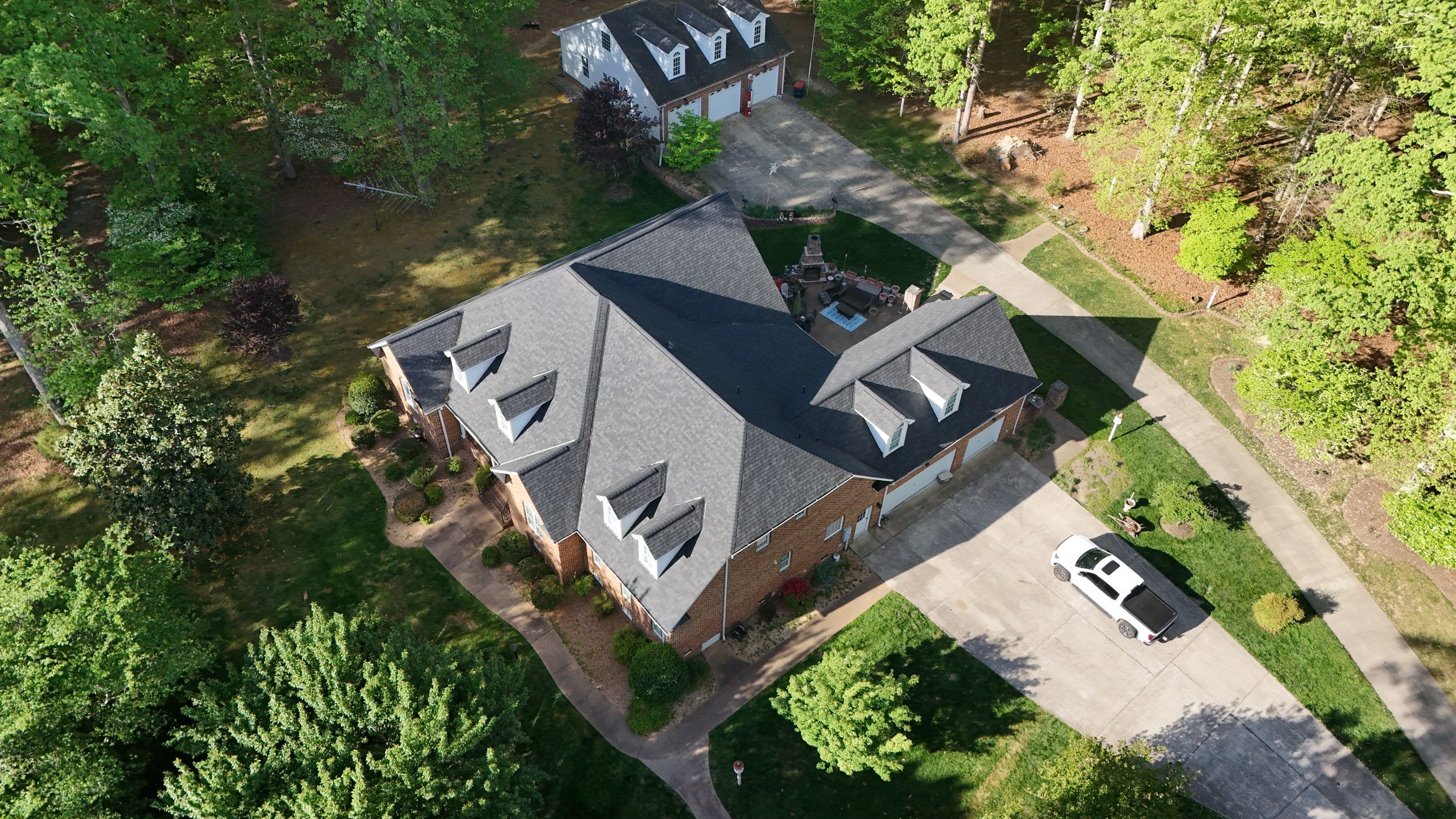 Comprehensive Roof and Gutter Replacement After Tree Damage in Midlothian by Cade Construction
