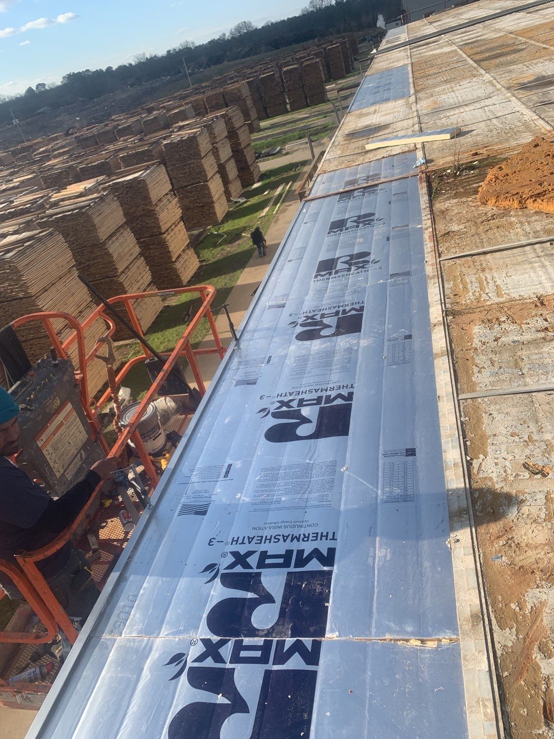 Commercial Roofing Installation using Aluminum Roofing panels by Hostetler Roofing