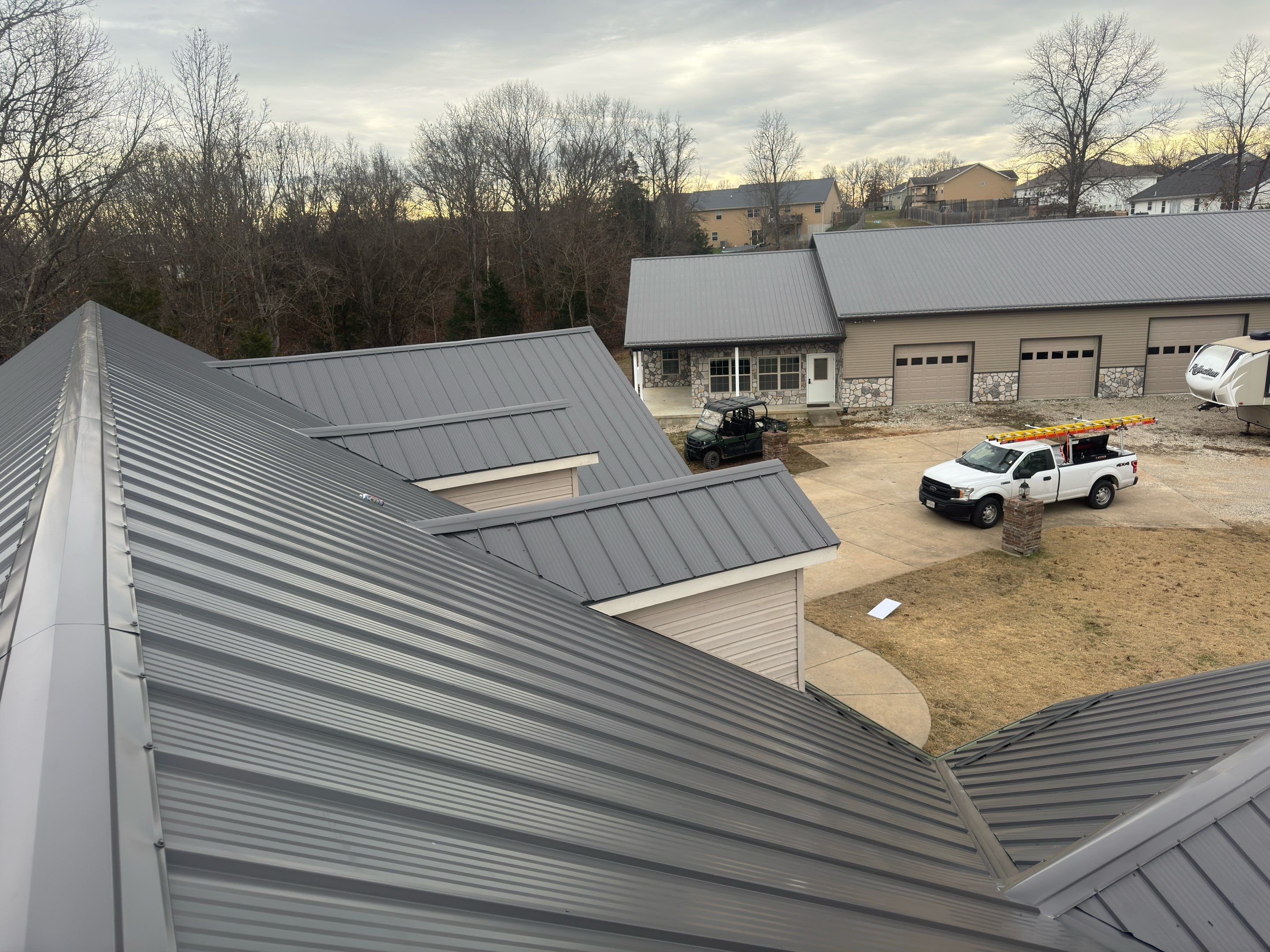 Residential Roofing Install - M Rib Exposed Fastener - Color Charcoal  by Titan Commercial & Residential Roofing 