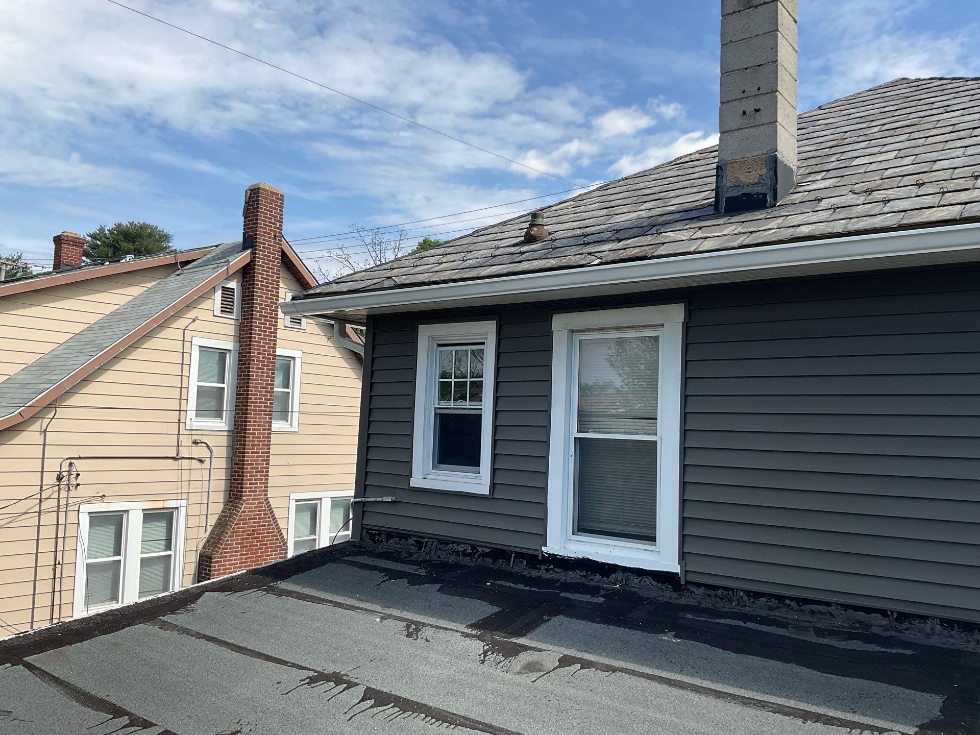 New siding & New Gutters by Alpha Design Services