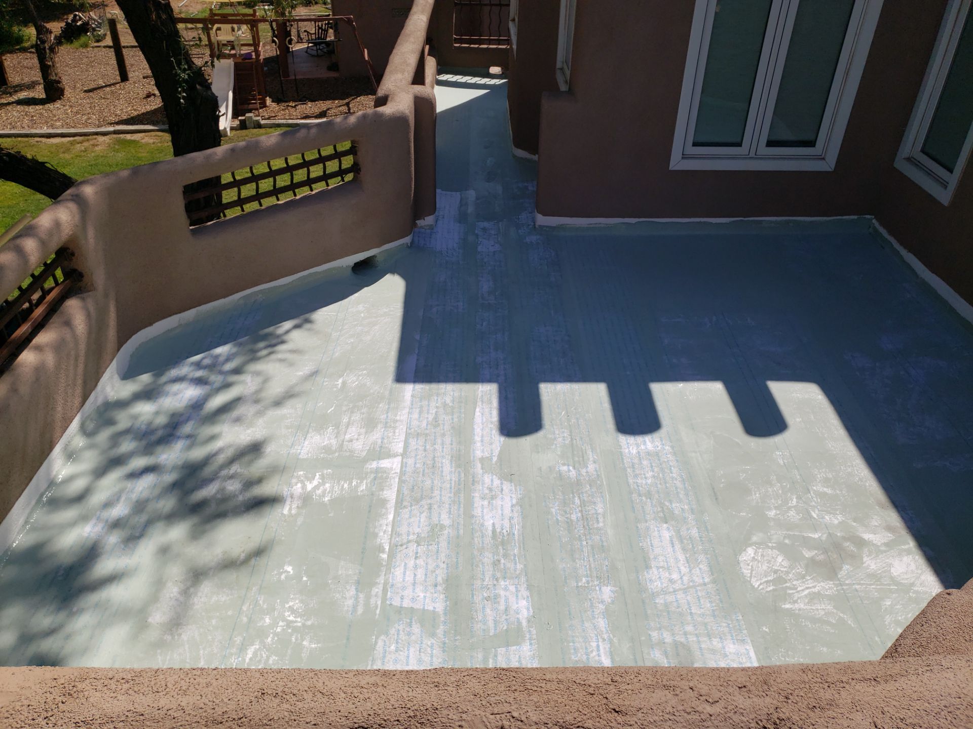 Residential roof application by SPF Services 