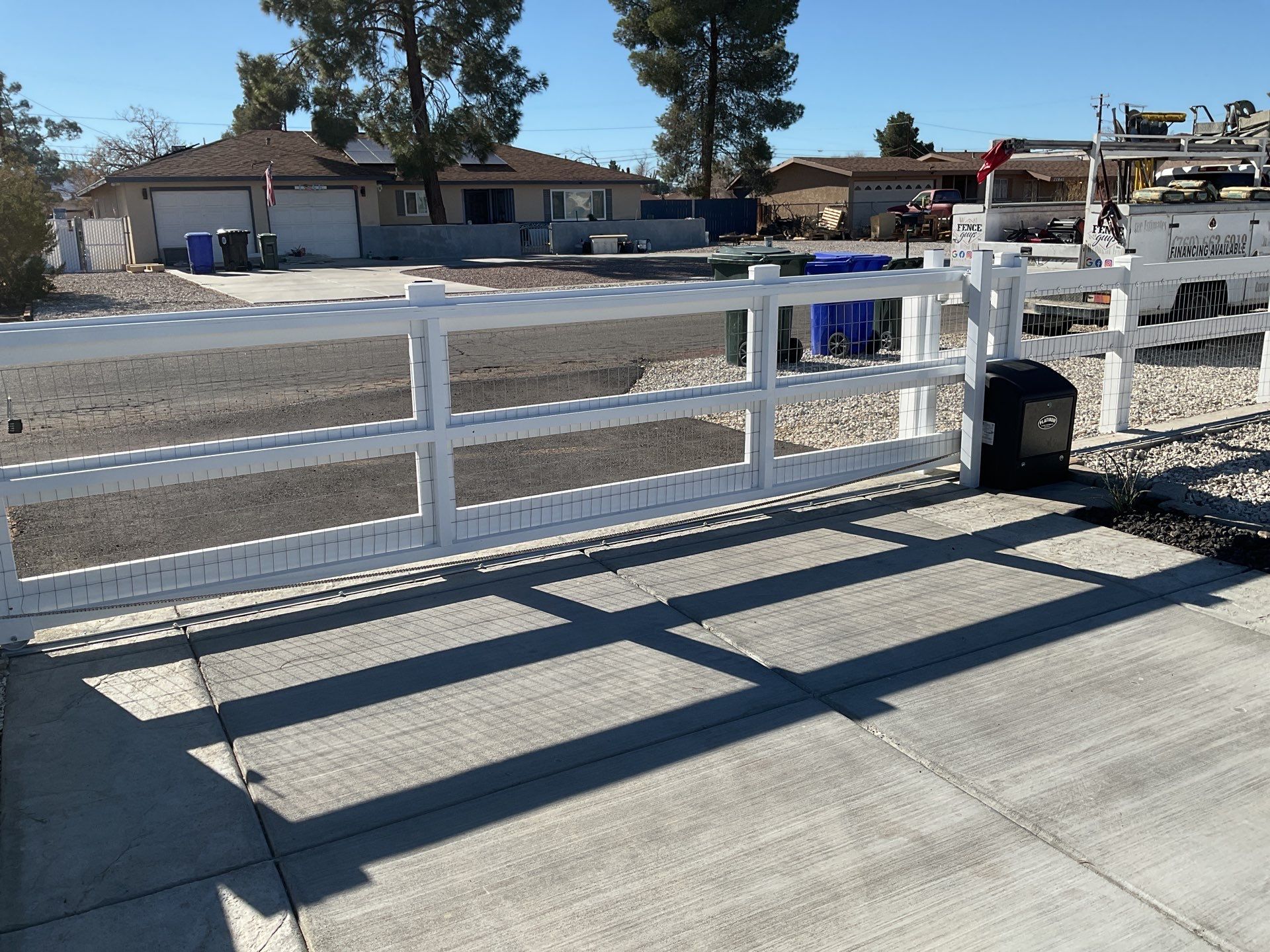 Automatic sliding gate by Fence Guys Inc. 