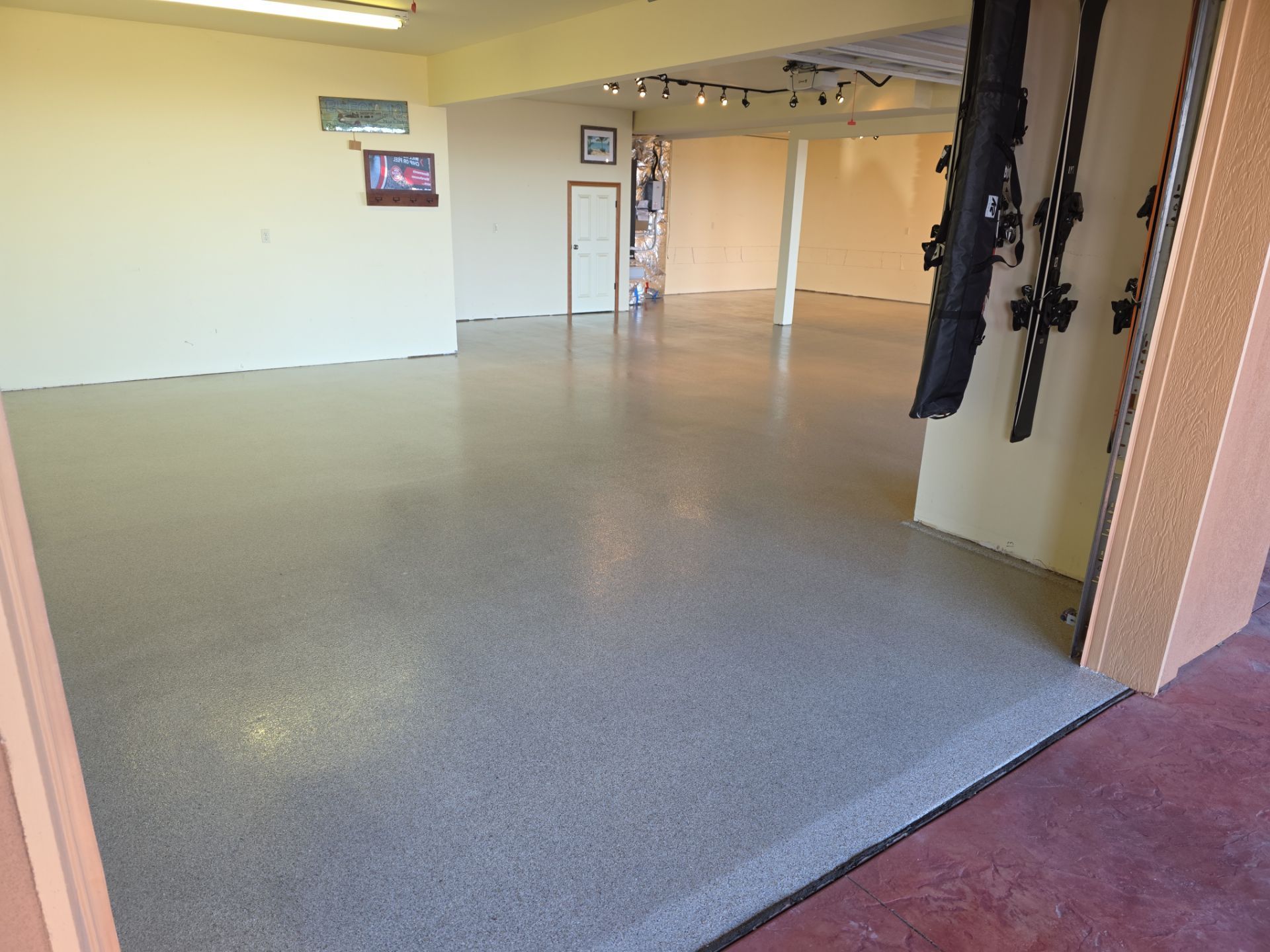 Garage Transformation using Stone/Marble Hybrid by Croc Coatings, LLC