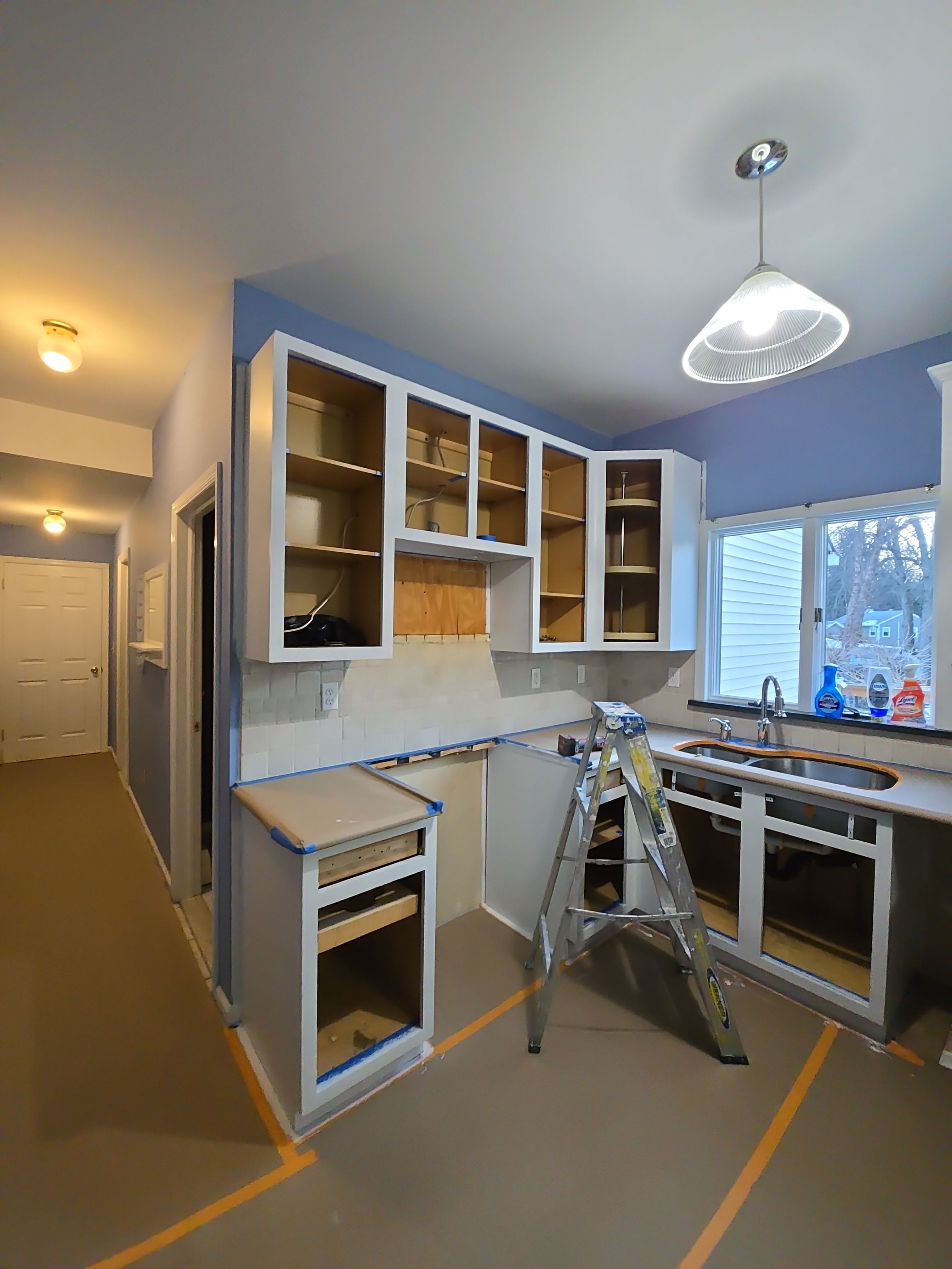 Cabinet Refinishing using Benjamin Moore Command by Spectrum Painting, LLC