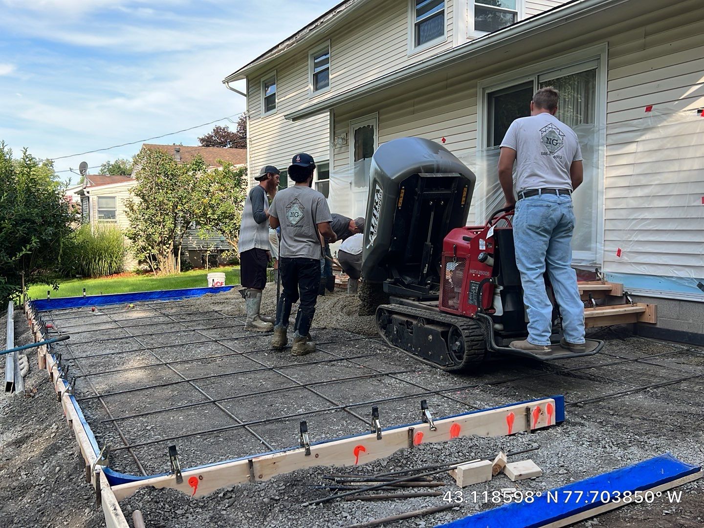 Bluestone textured stamped concrete patio by NG Masonry & Construction LLC