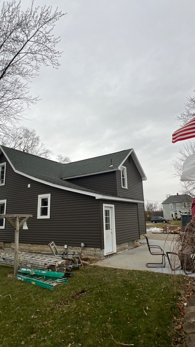 Residential fascia replacement using Exterior Portfolio 4.5 DL - Peppercorn by Nitro Roofing and Construction