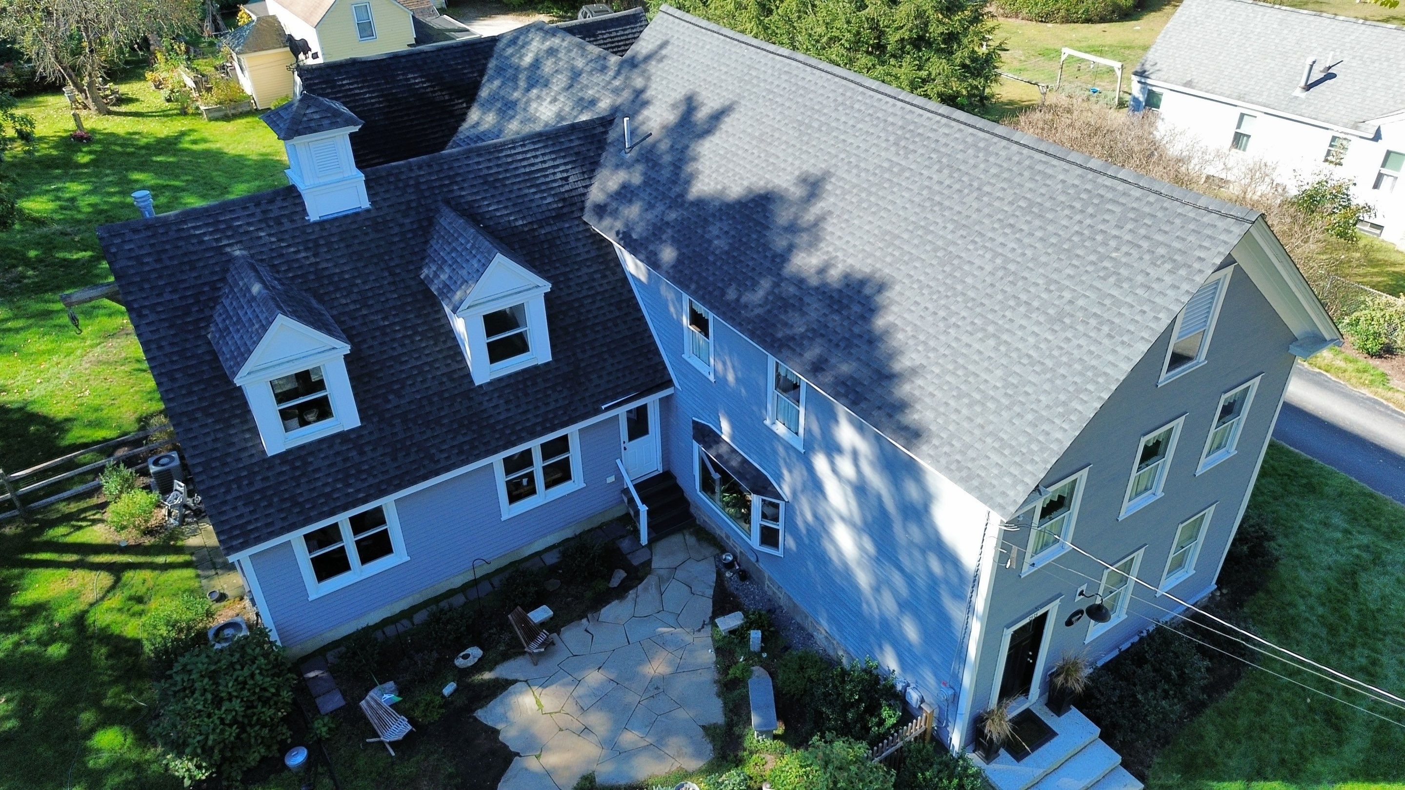 Roof Replacement & Chimney Removal – Westford, MA by Mighty Dog Roofing of Greater Middlesex County
