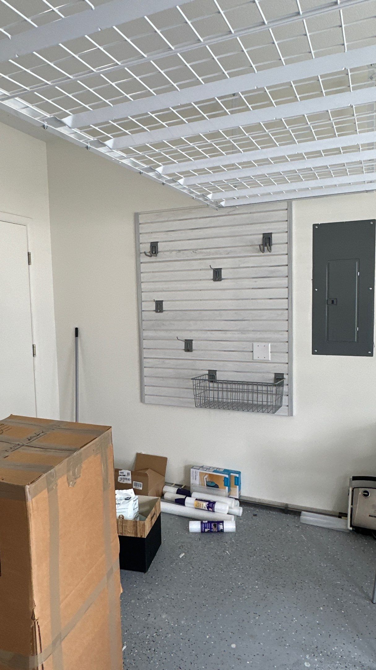 Michael M. upgraded his garage with overhead racks and slotwall by Banner Garage