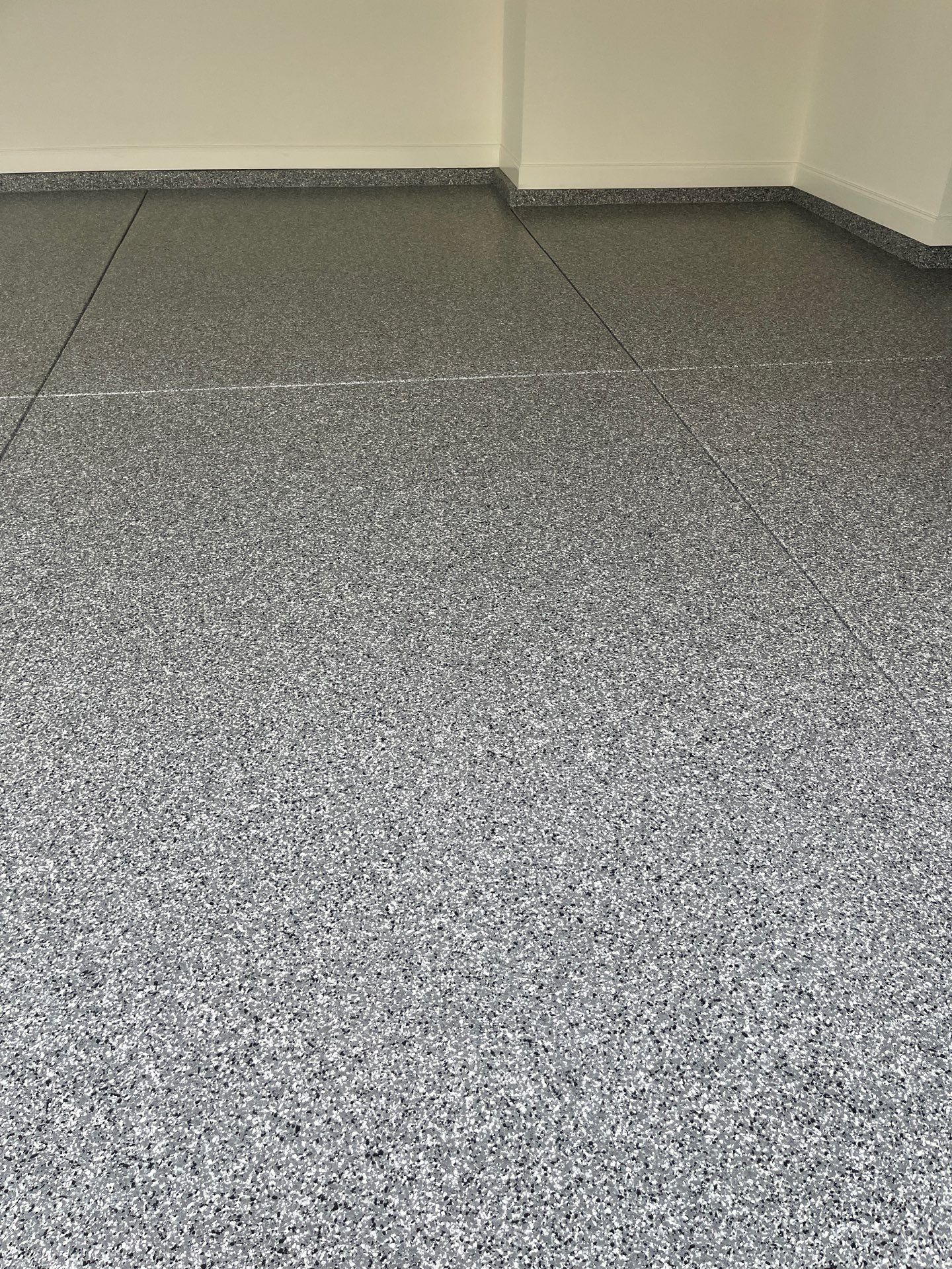 Garage Floor Coating using Wombat by My Garage Floor Guys