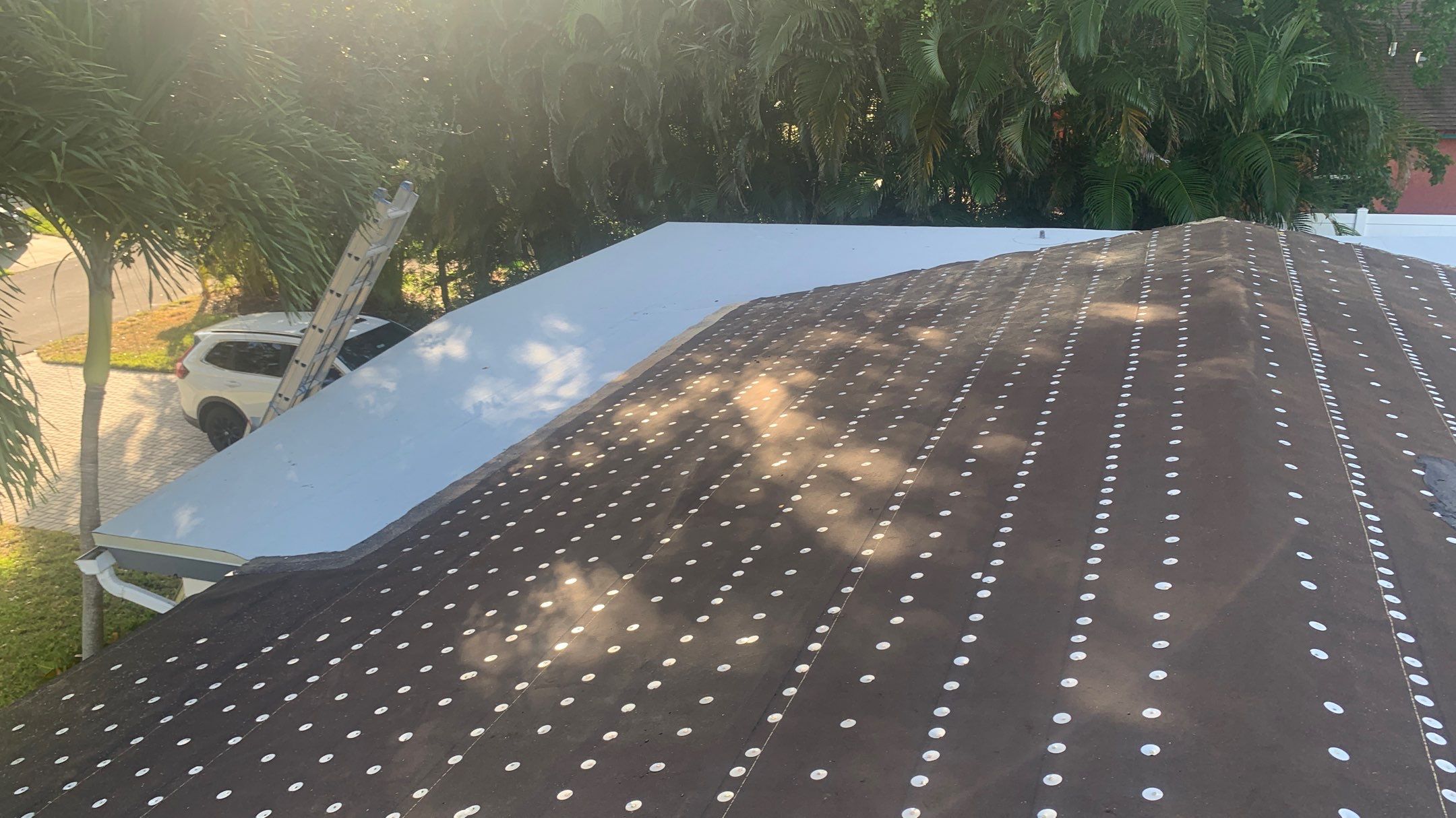 Residential Roofing Installation using 1" Nail strip metal roof by BLUES BROTHERS ROOFING