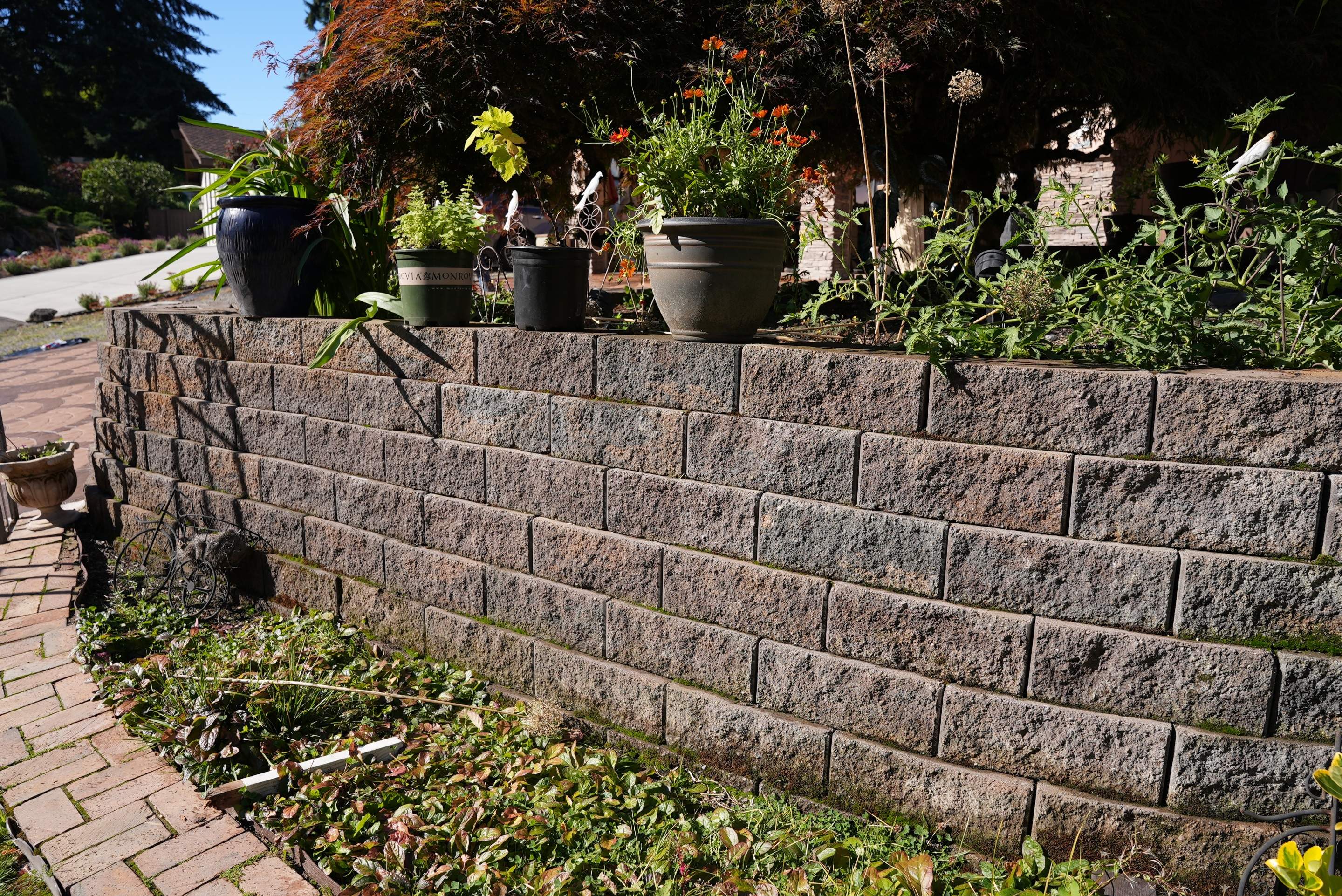 Mehta | Tiled Driveway with Sealer & Retaining Wall  by Jireh Asphalt & Concrete Inc 