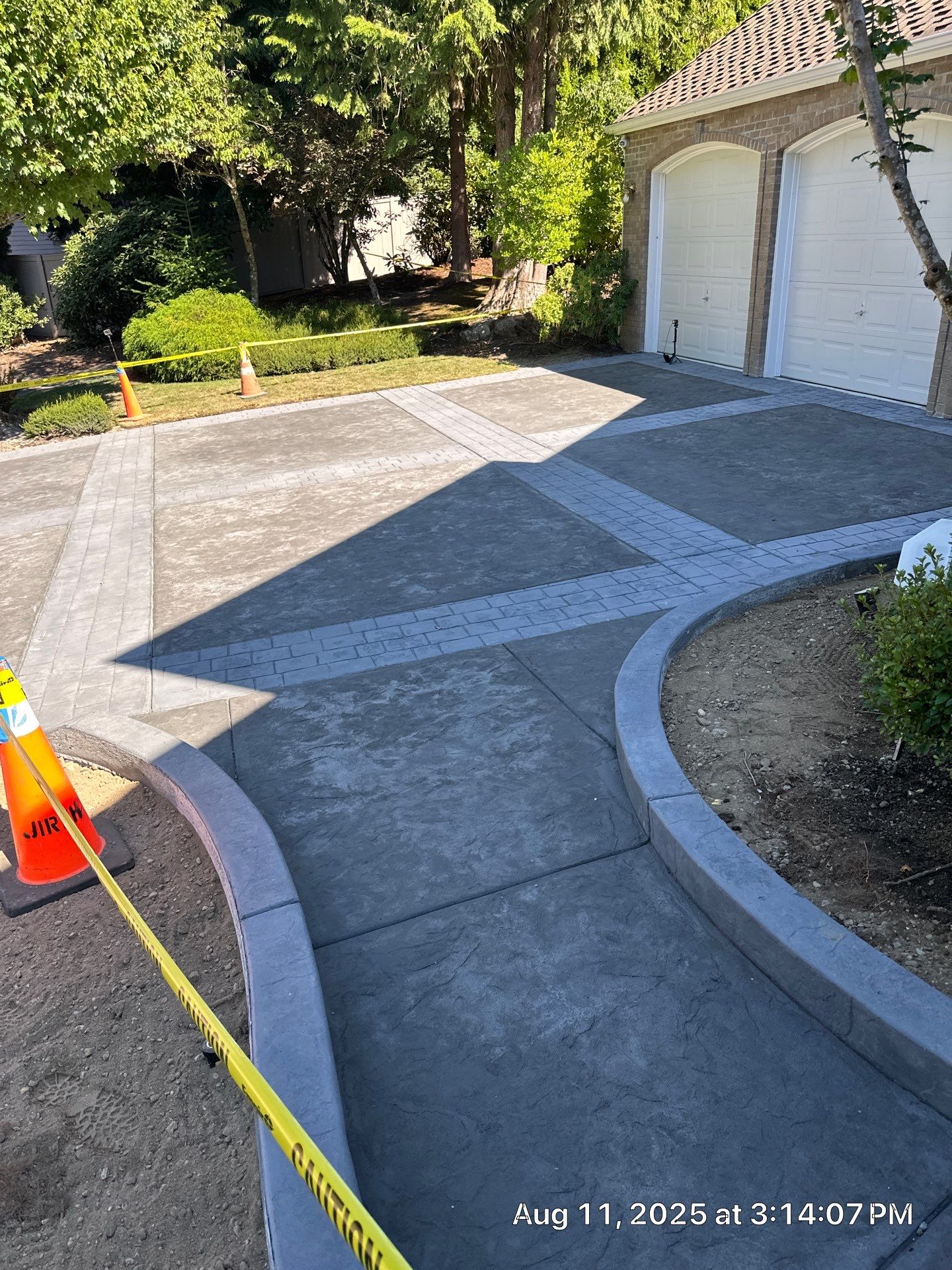 Multi-color Stamped & Sealed Concrete Driveway Renovation | Mukilteo by Jireh Asphalt & Concrete Inc