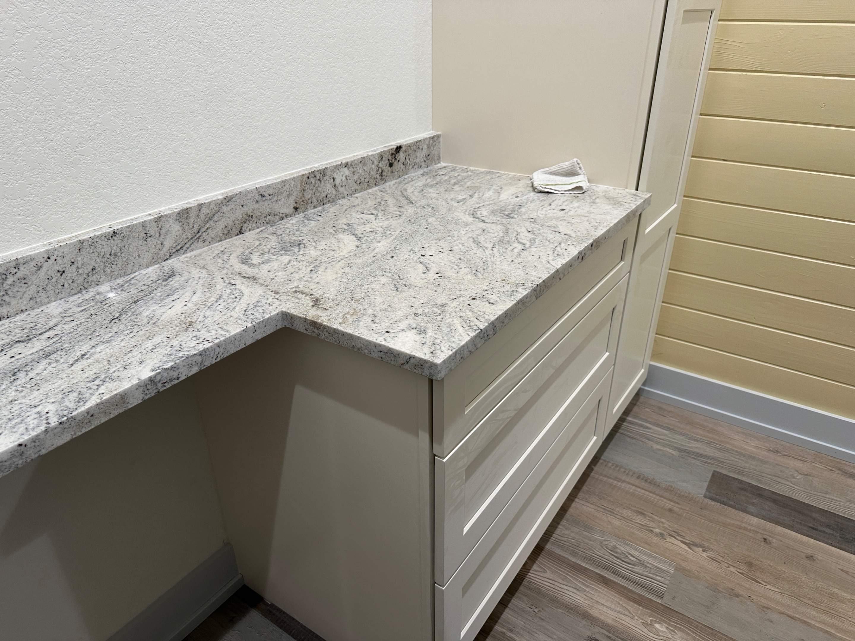 Antique shaker cabinets and granite kitchen and bathroom installation by Mena stone surfaces