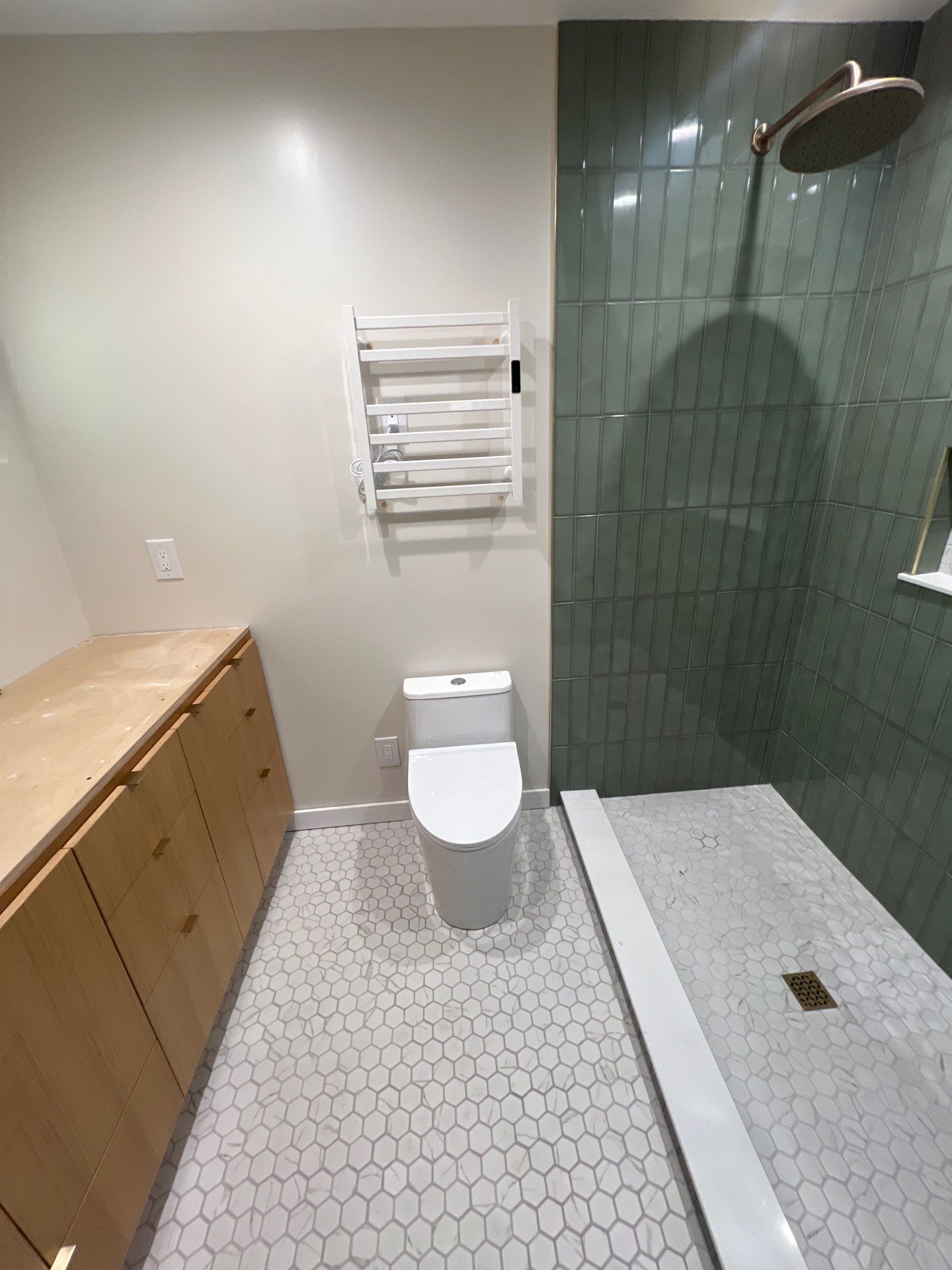 Custom Bathroom Remodel with Heated Floors and Vertical Sage Tile by  H4H Remodeling and Repairs Inc.