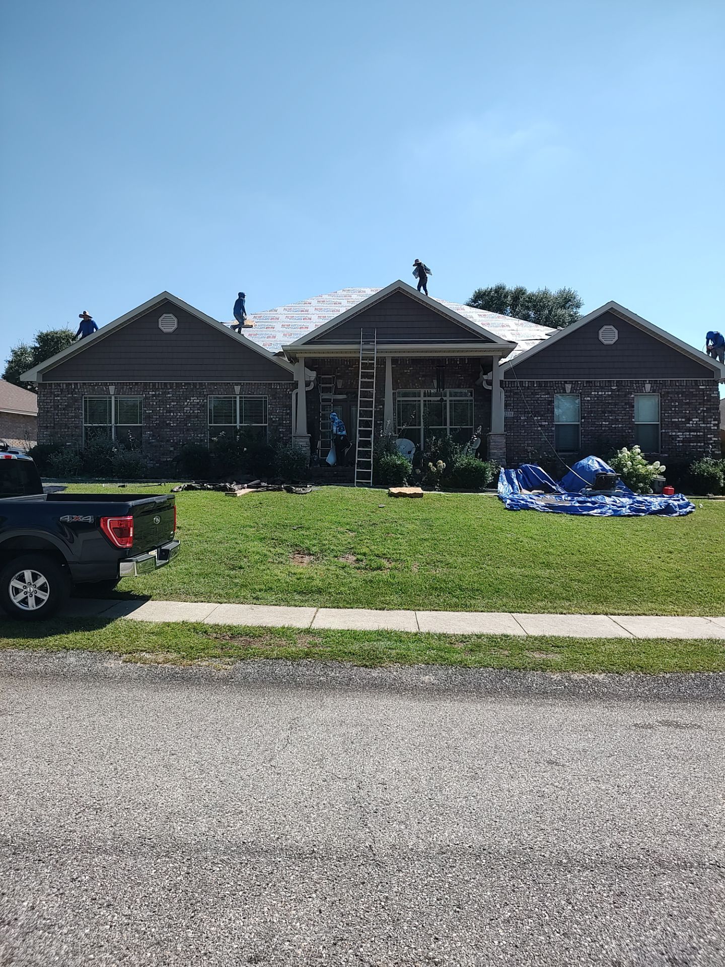 Residential Roof Replacement using ATLAS PROLAM WEATHER WOOD by Elite Roofing LLC