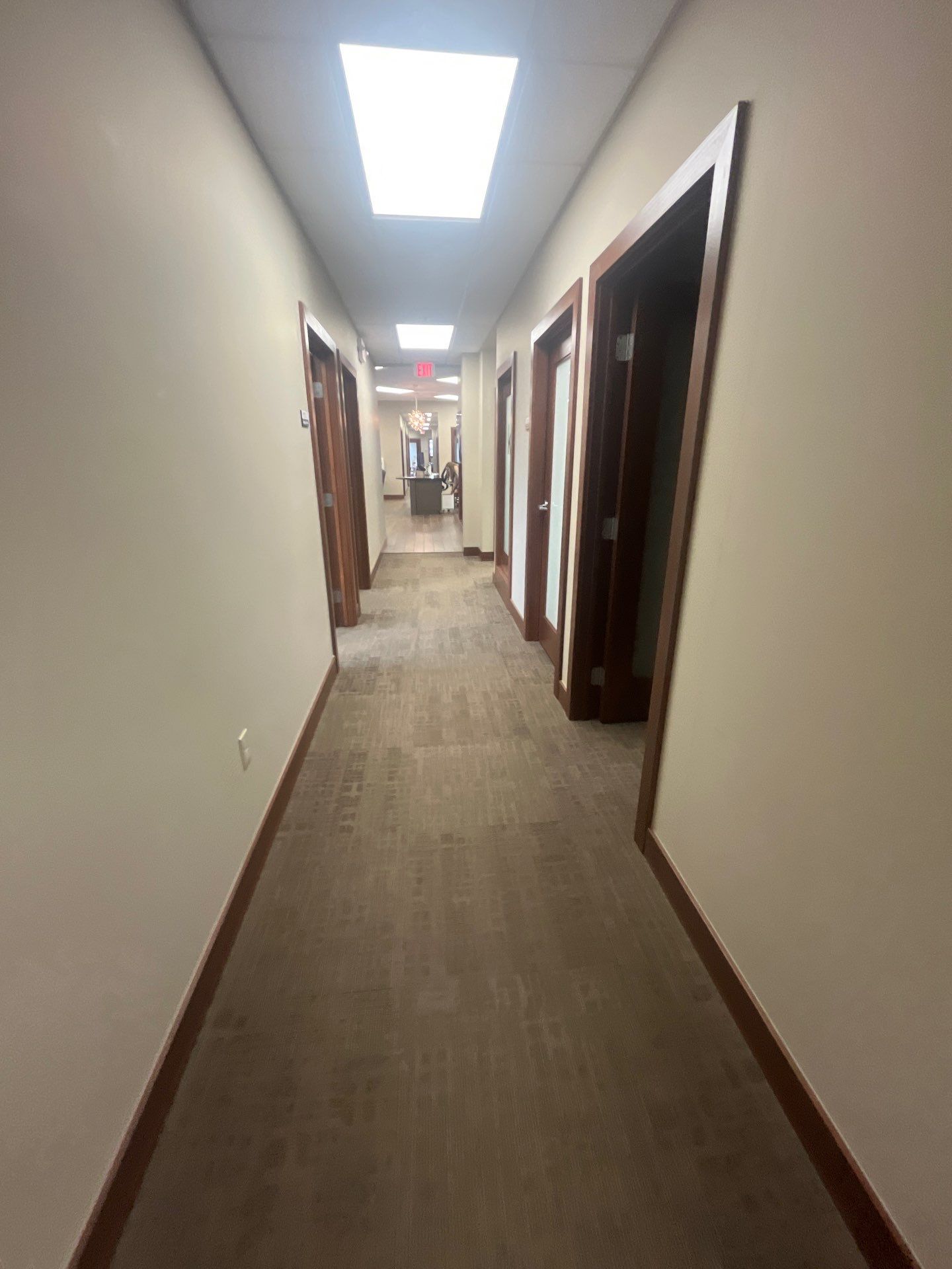Commercial Office Interior Remodel and Modern Suite Refresh in Sioux Falls by Select Painting, Coatings & Garage Cabinets