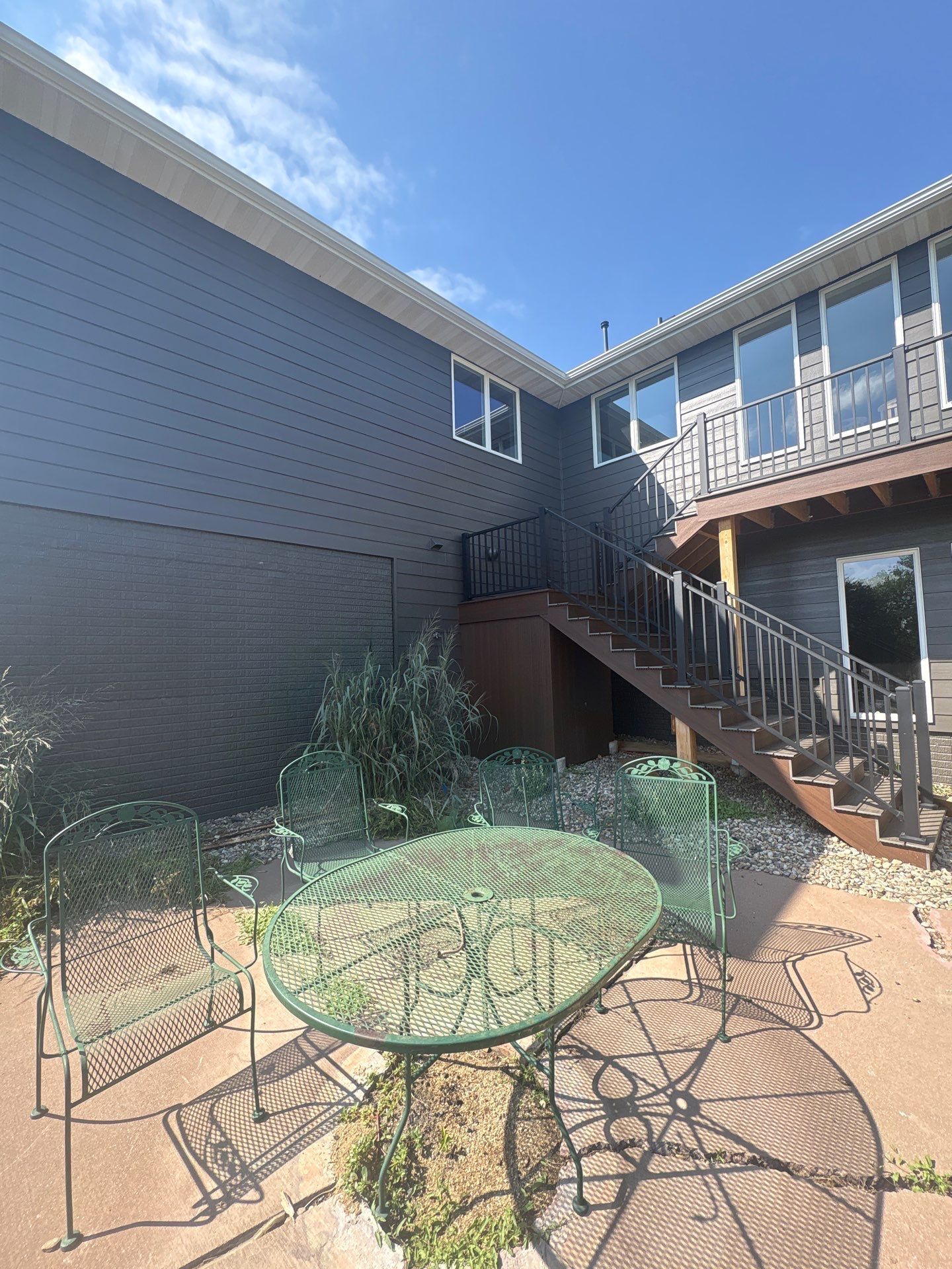 Sioux Falls Residential Exterior Painting and Siding Refresh by Select Painting, Coatings & Garage Cabinets