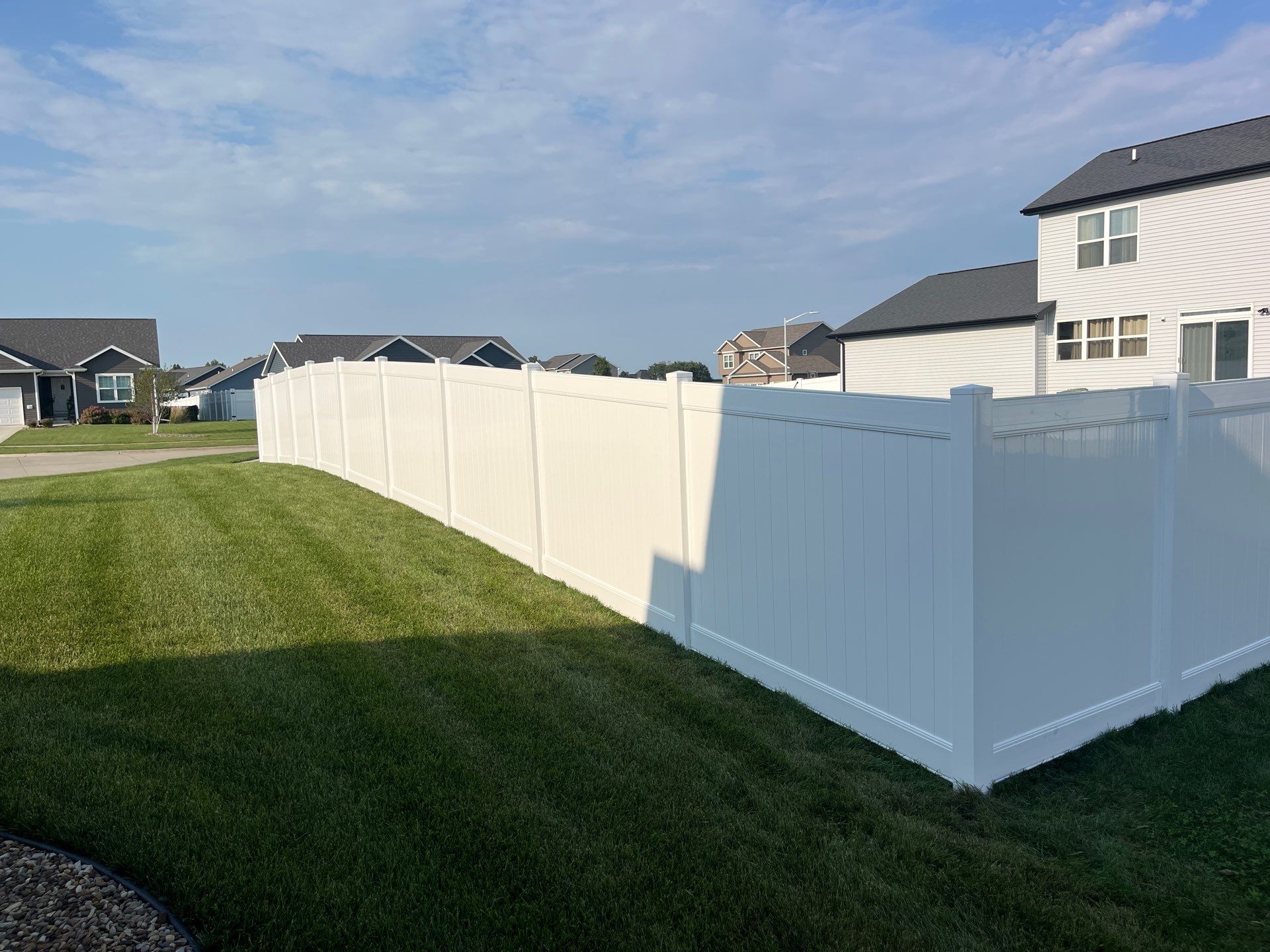 White Vinyl Privacy Fence Installation With Double Gates in Waterloo by Perfect Picket Fence and Stain