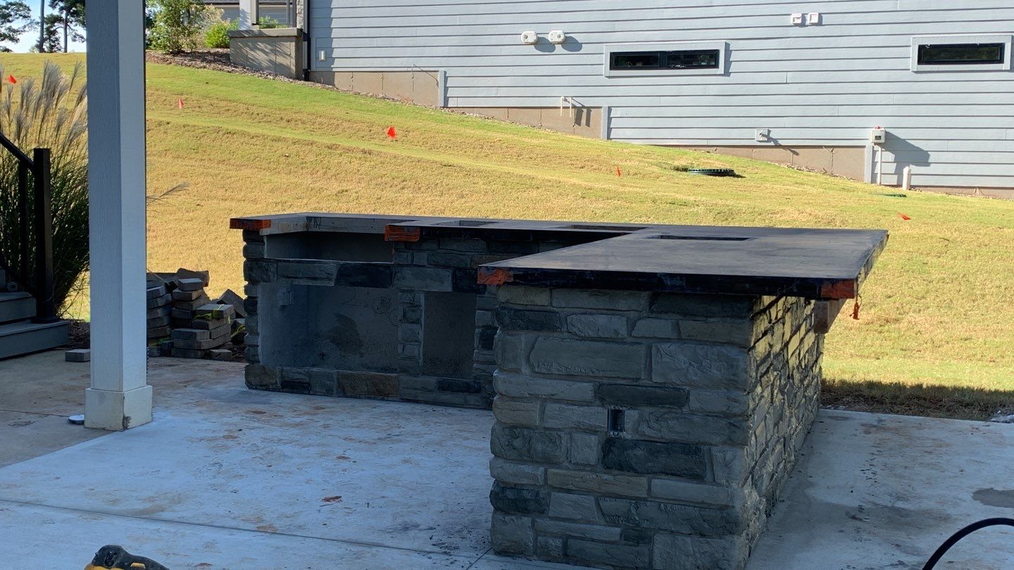 Outdoor Kitchen on Lake Keowee by Xtreme Concrete Services