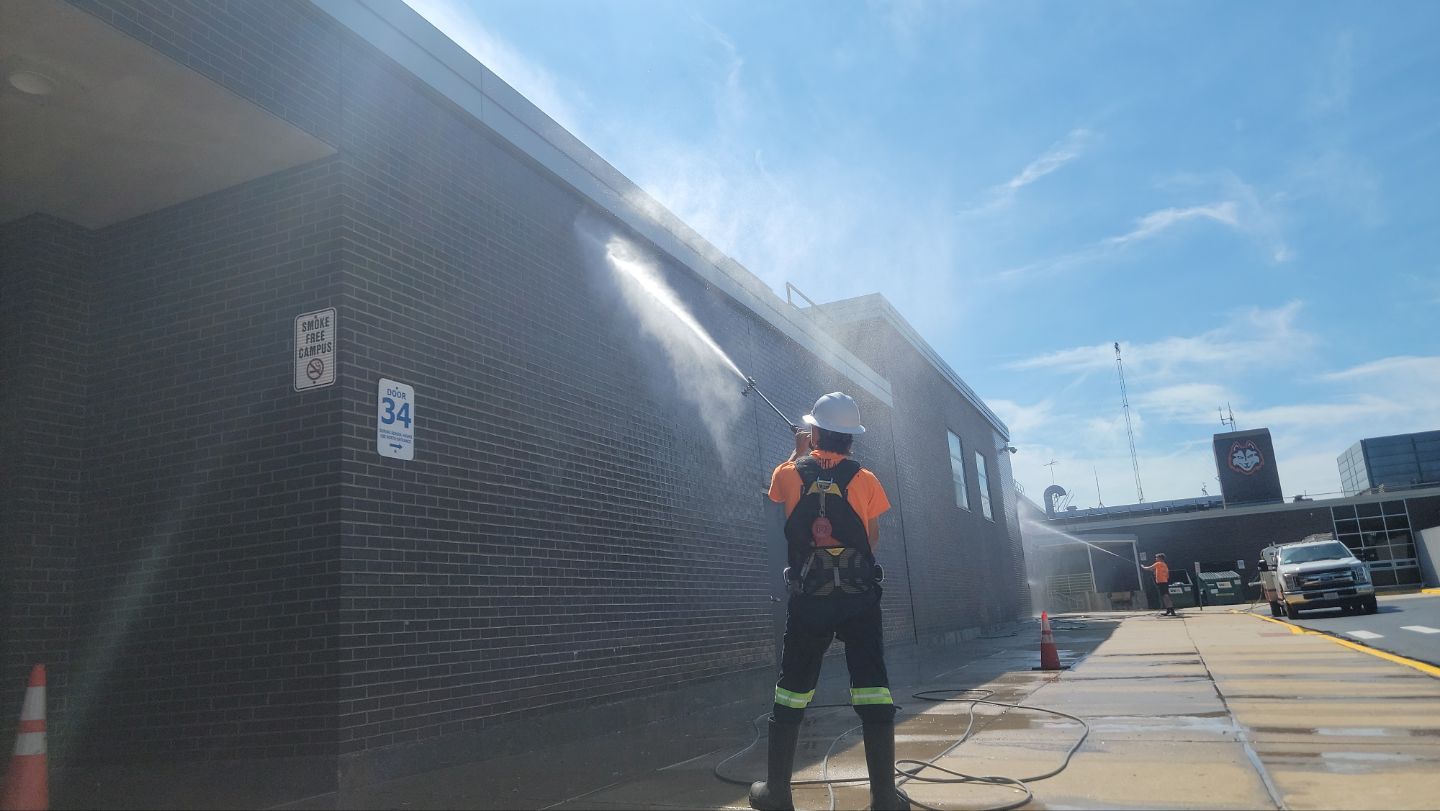 commercial pressure washing using Algaecide, soft wash soap by Northern Power Washing LLC.