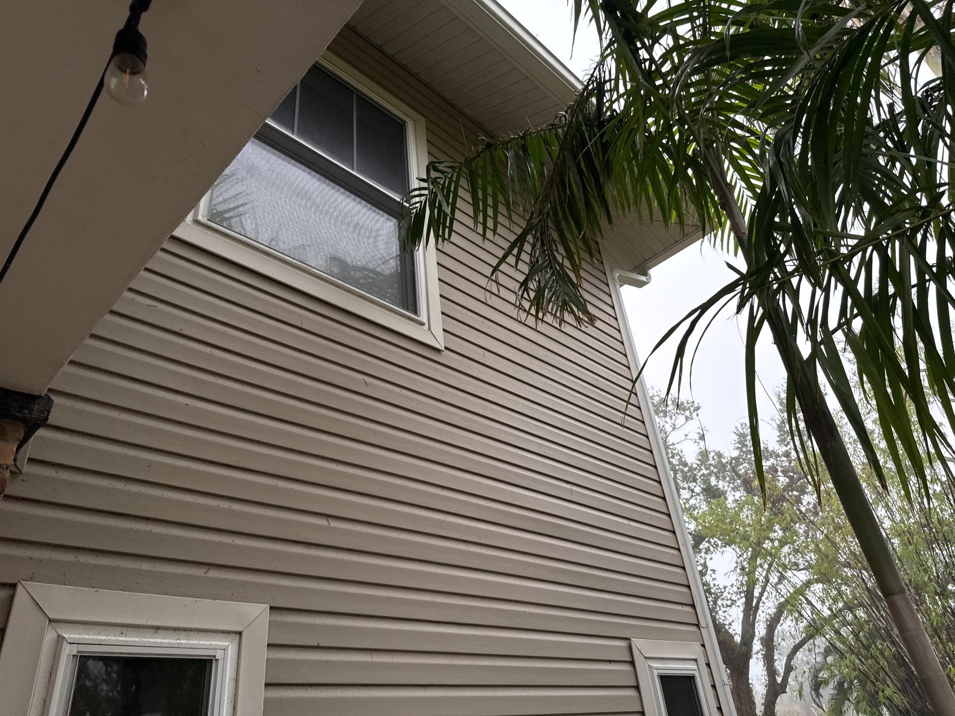 2-Story House Wash and Garage Pressure Washing in Palmetto, FL by Sunshine AquaWash