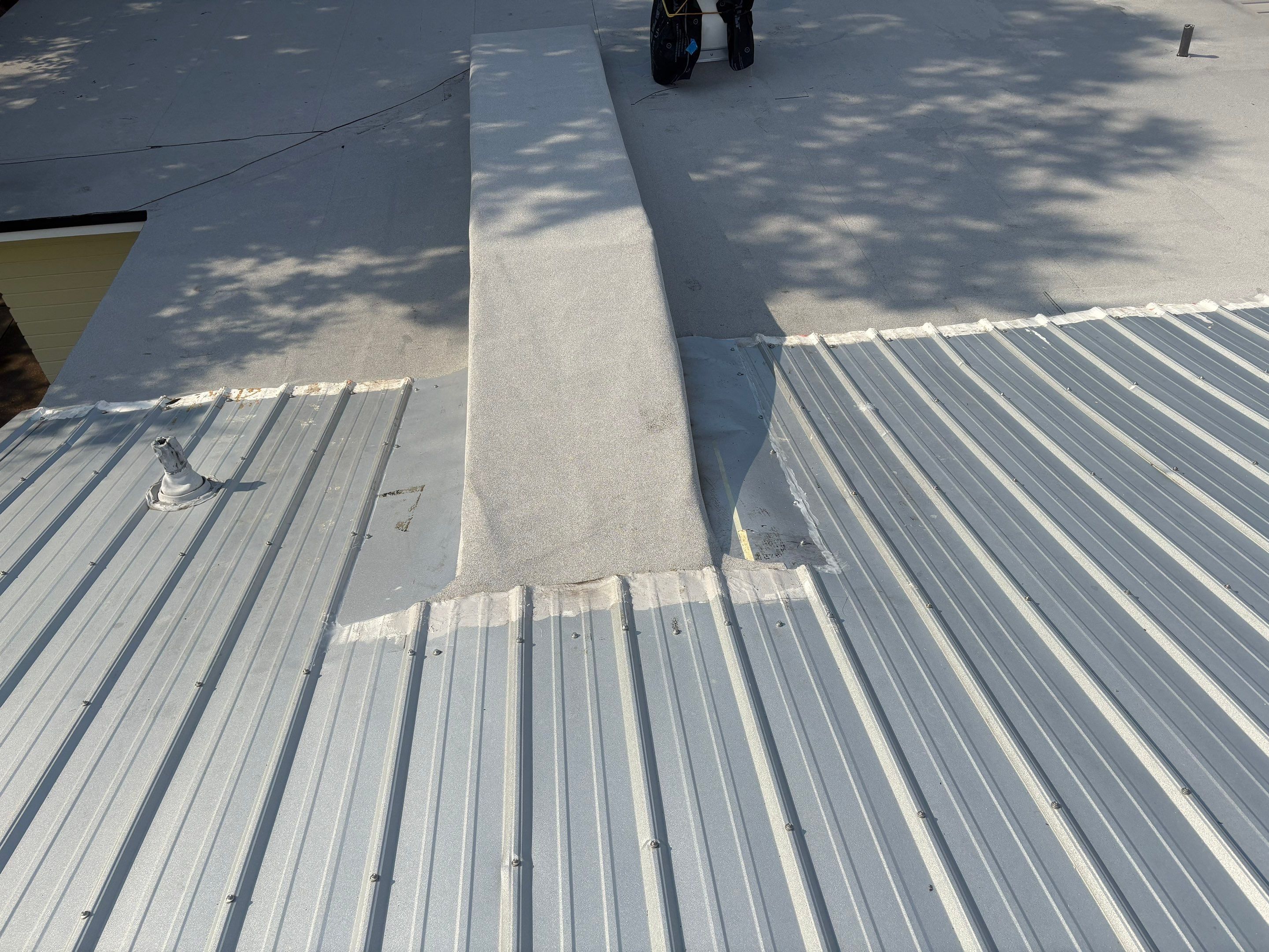 Flat Reroof Replacement New Smyrna Beach FL by Pinnacle Roofing Group