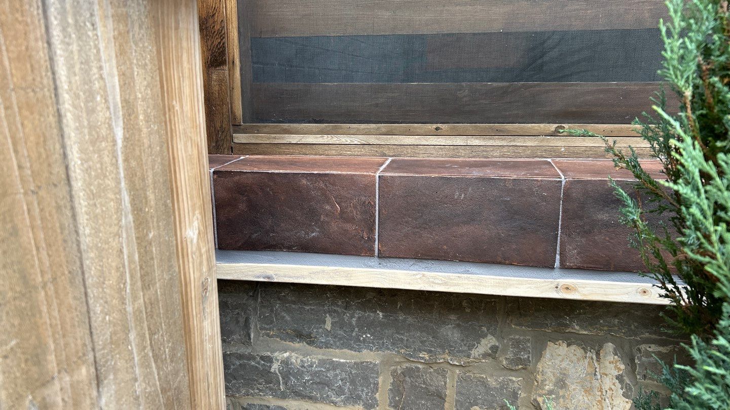 Terra cotta porch  by Footprints Floors of Nashville