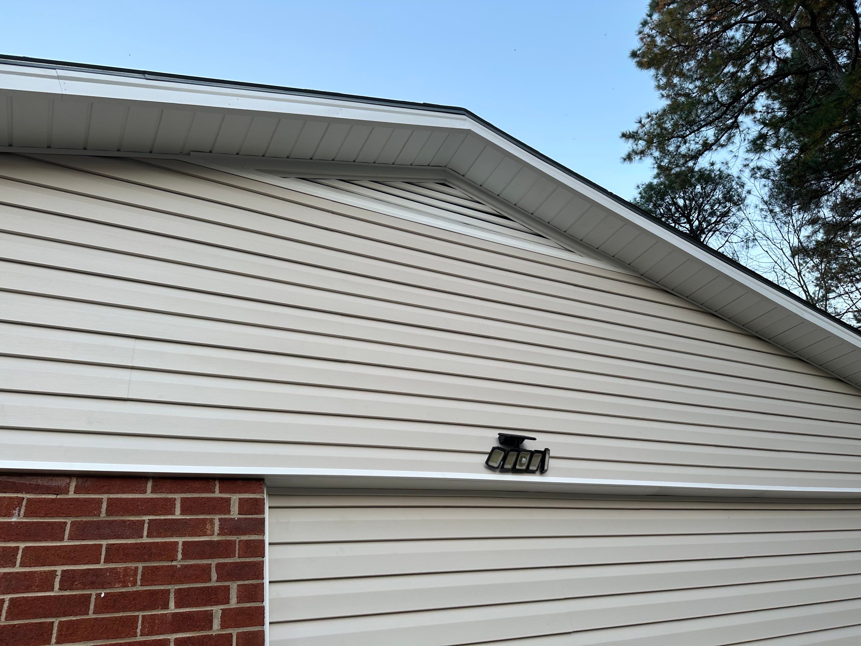 Vinyl Siding Replacement and Trim Capping for Fayetteville Home by The Remodeling Company