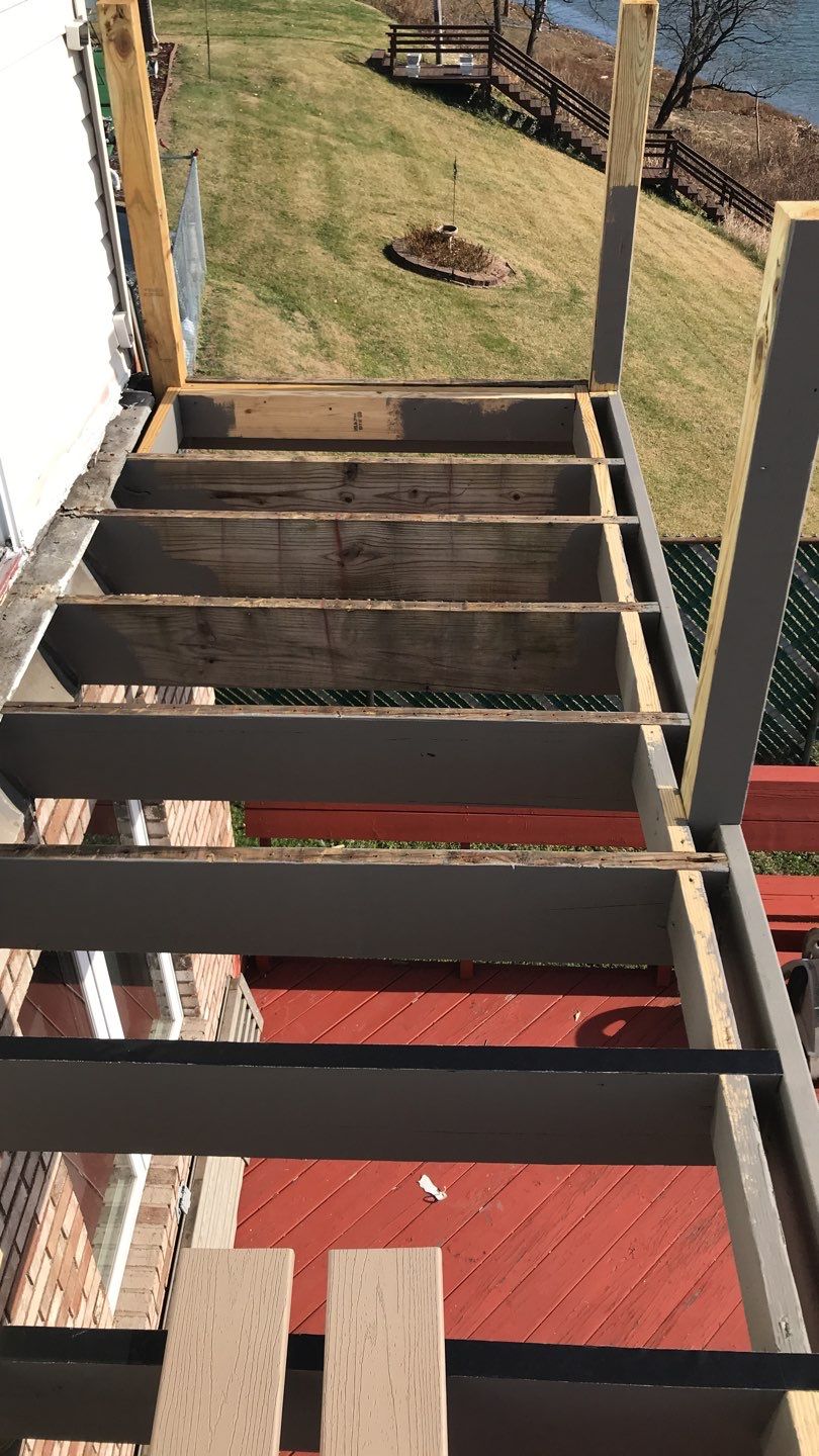 Deck Refurbush and Door Replacement using Trex Decking and Railing. Polaris Patio Doors by Secure Construction Company Inc