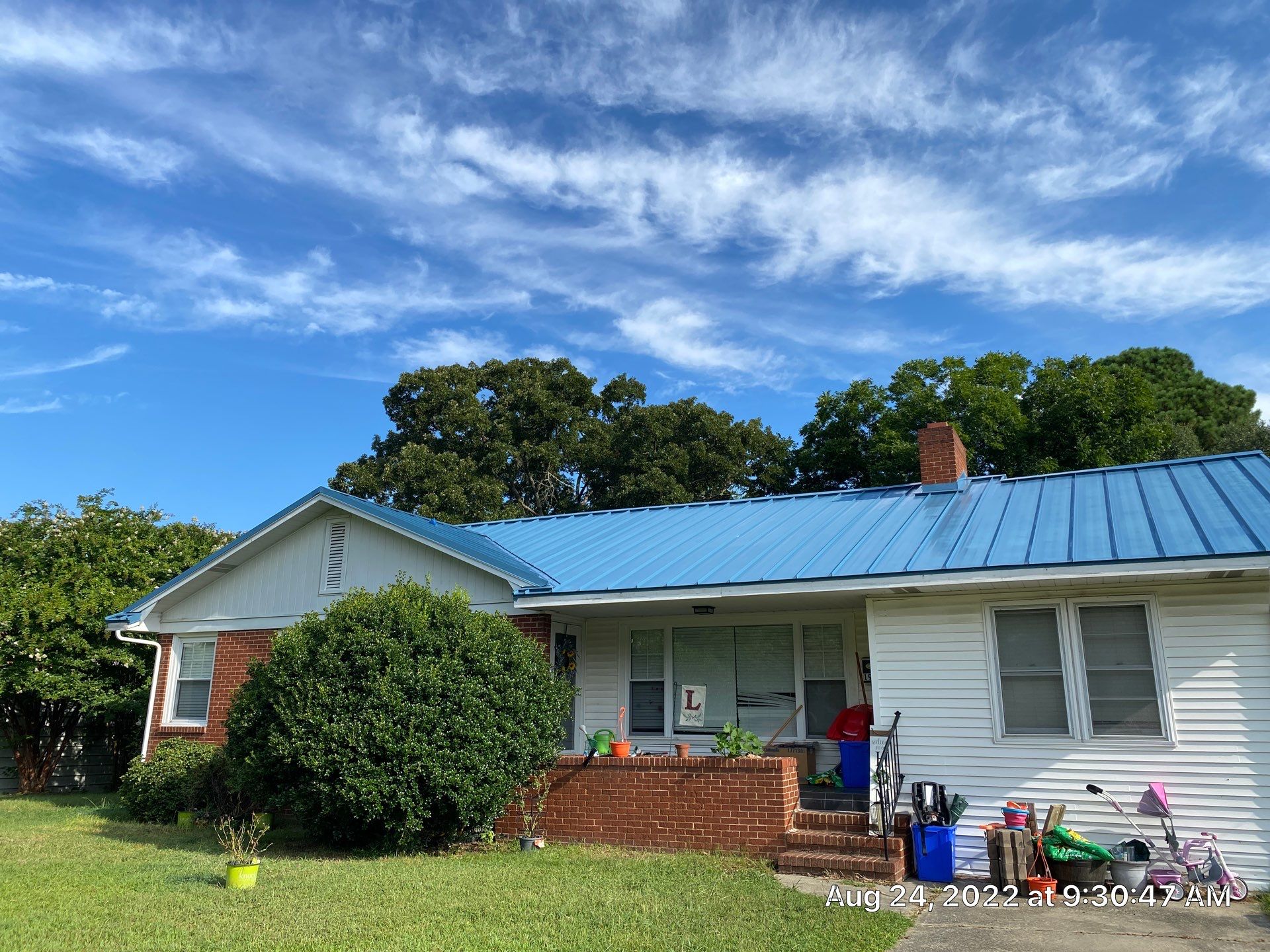 Carolina Blue Standing Seam Roof by Just In Time Roofing and Restoration