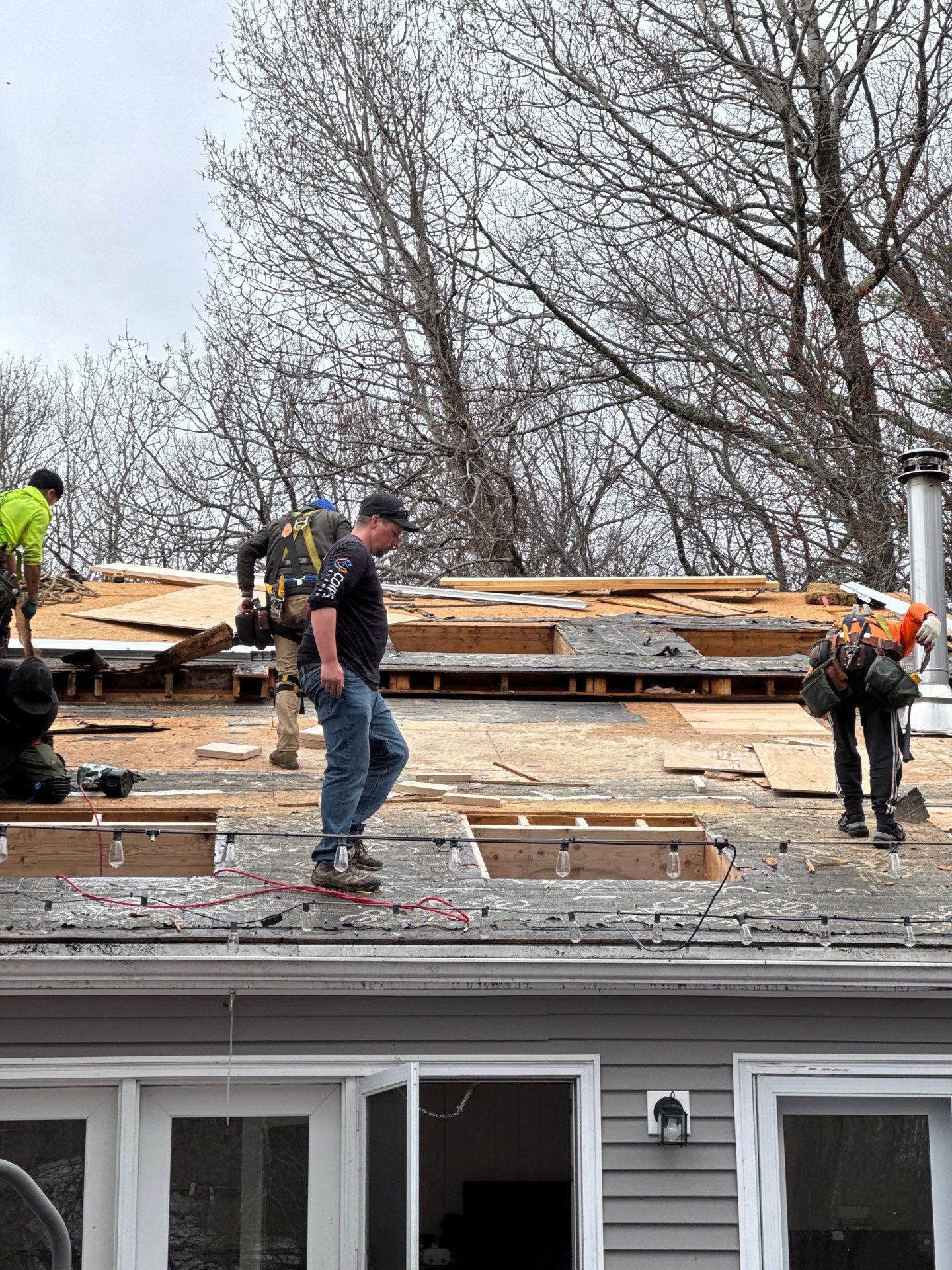 Roof Replacement in Stratham, NH with Structural Repair and Skylights by Compass exteriors
