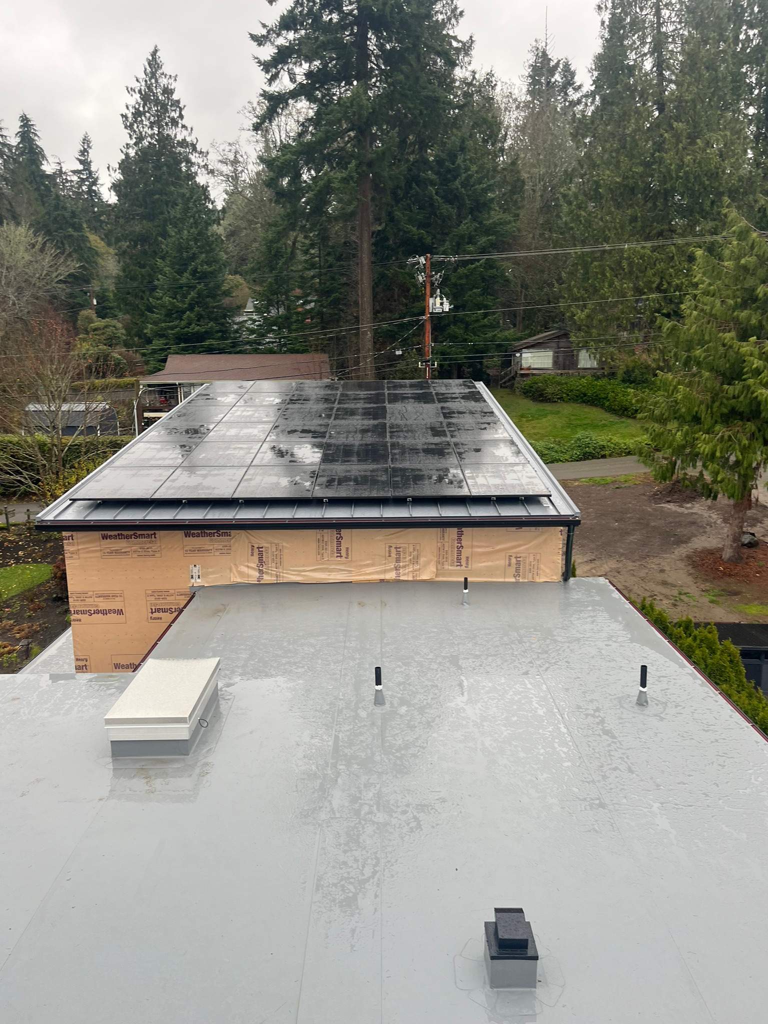 New Construction Roof Installation in Indianola, WA by Hanley Construction