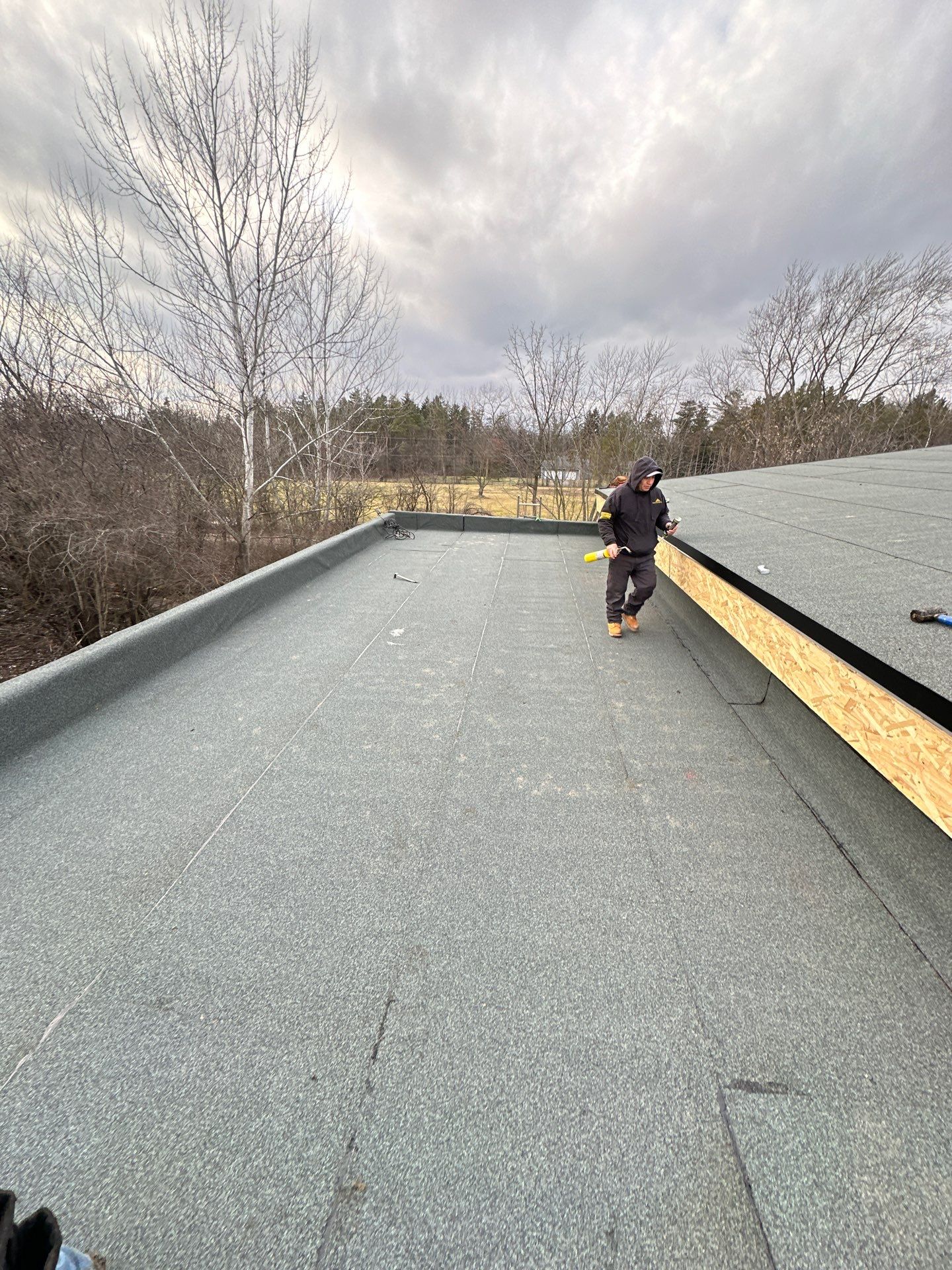 Residential Roofing Installation using Flat Roofing  by Perfect Exteriors Inc. 