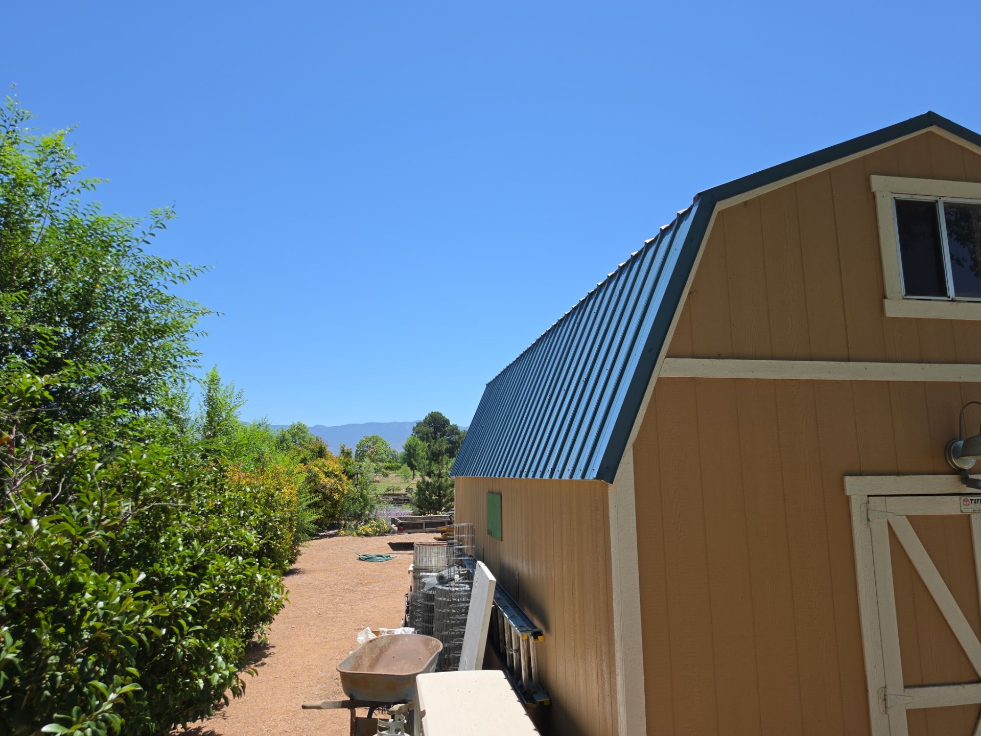 Hawaiian Blue metal Shed roof makeover in the North Valley by Doyle Roof Masters Inc