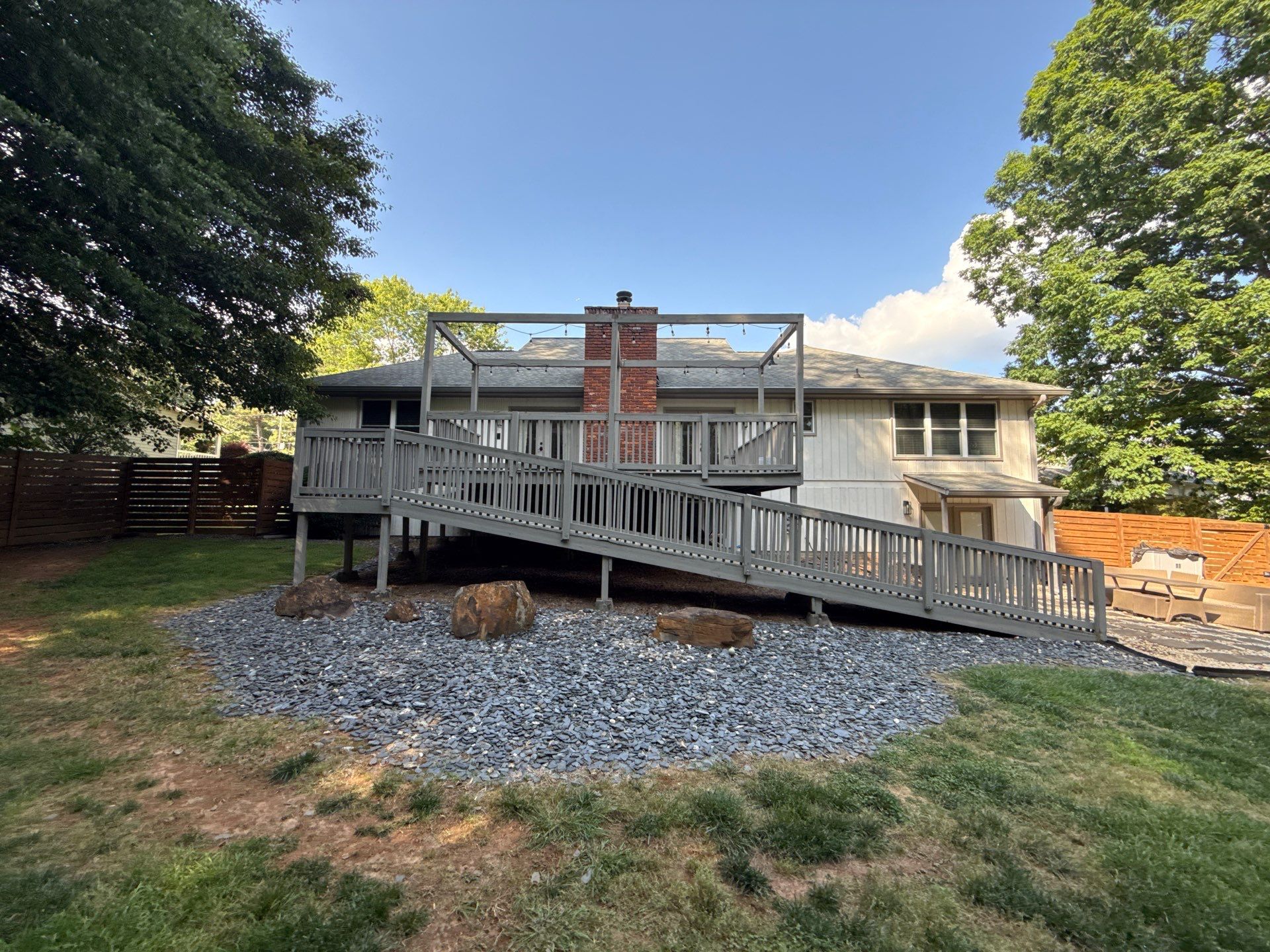 Deck and Shed Roof Style Covered Build using Trex Decking Products by Nelson Exteriors 