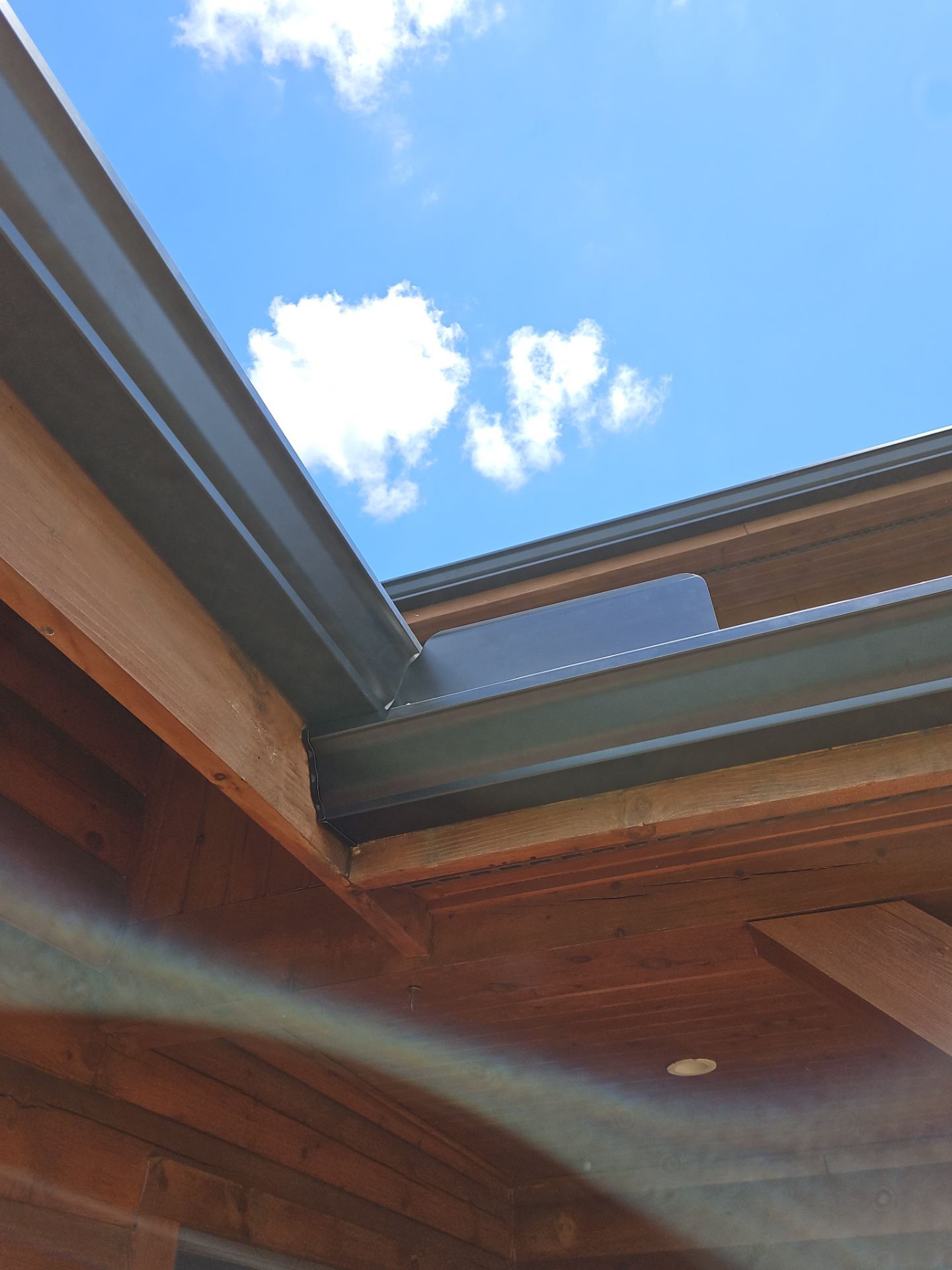 Residential Roofing Installation using Performance Panel Metal - Frost Black by RoofX 