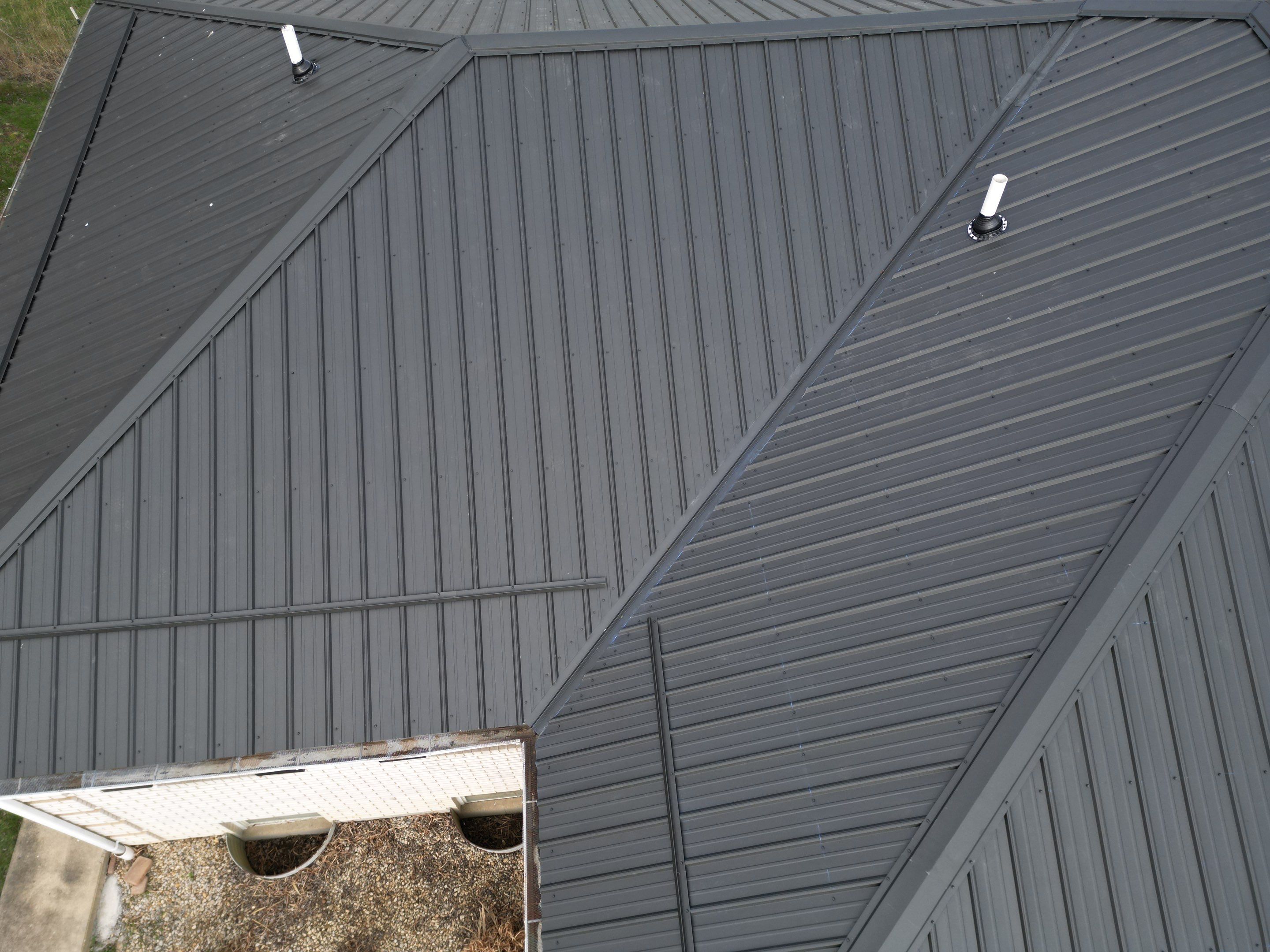 Commercial Roofing Installation using Performance Panel Metal - Frost Black by RoofX 