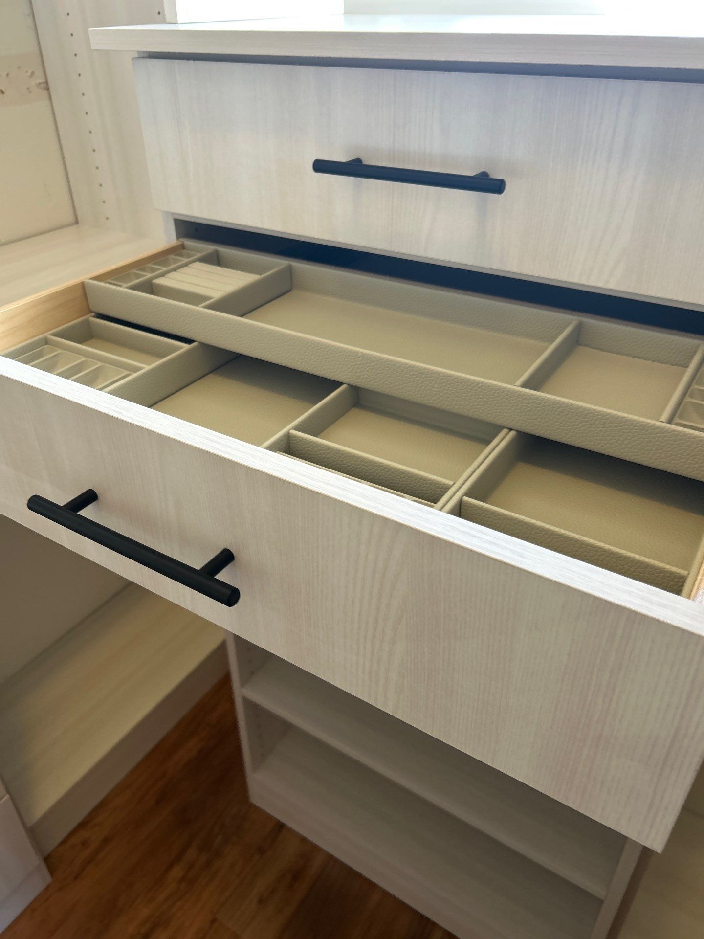 Walk-in Closet in a Small Space by Concept 32, Inc.