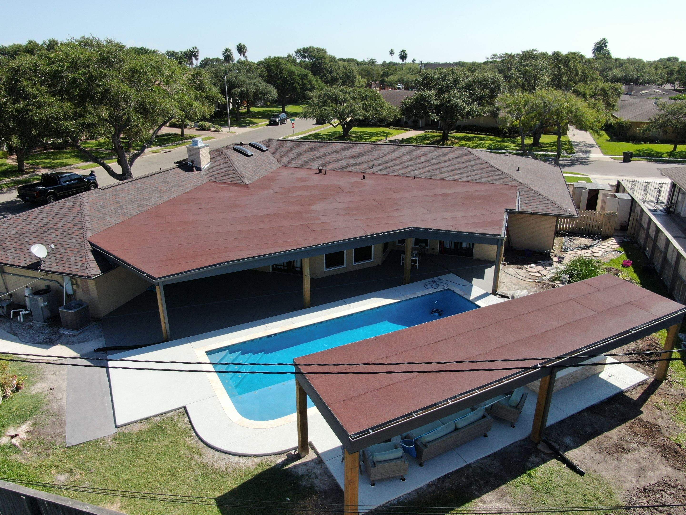 Beautiful pool side build by Bayfront Roofing and Construction