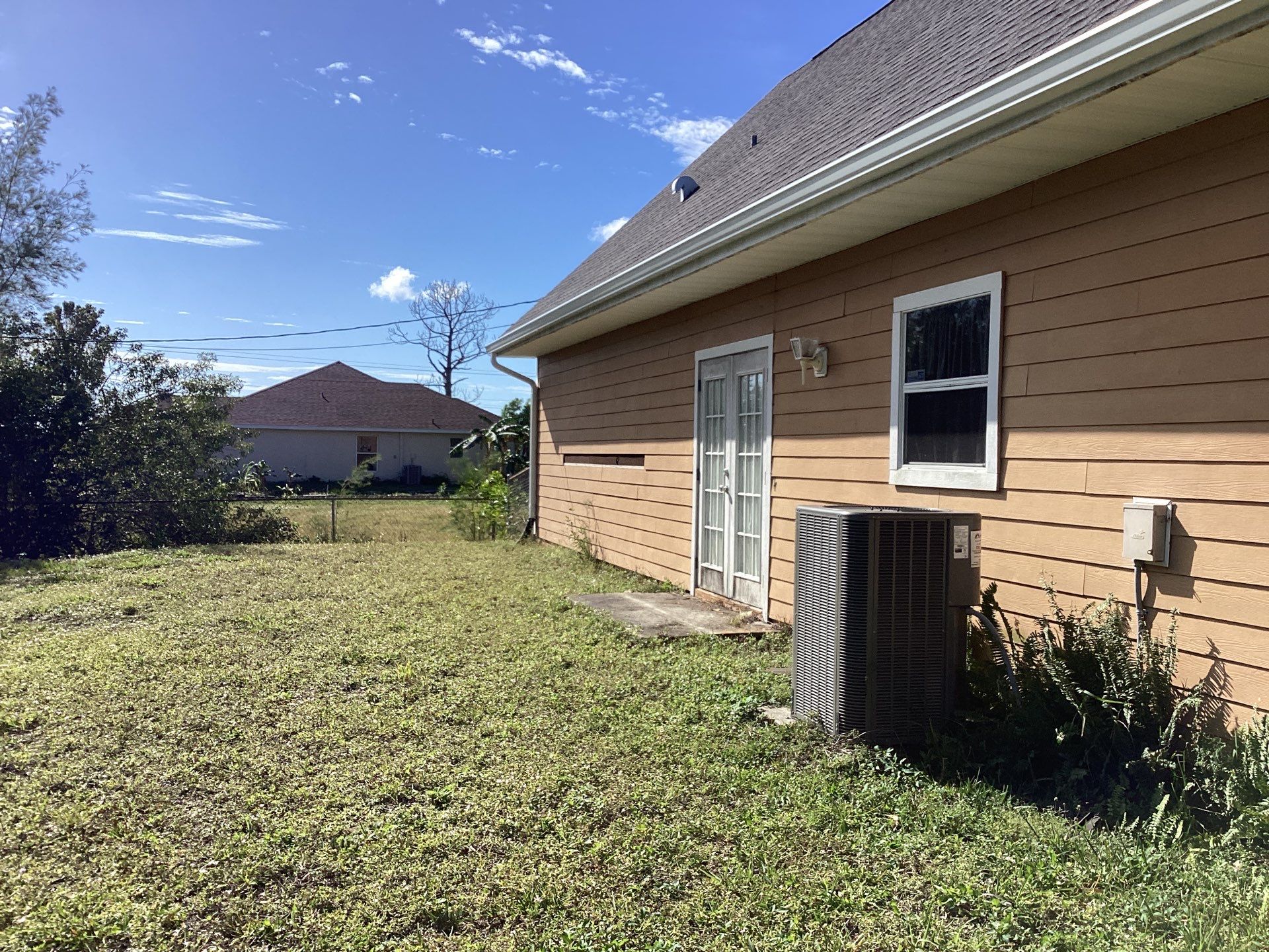 Soffit & Fascia White + New Downspouts by Gutter Professors