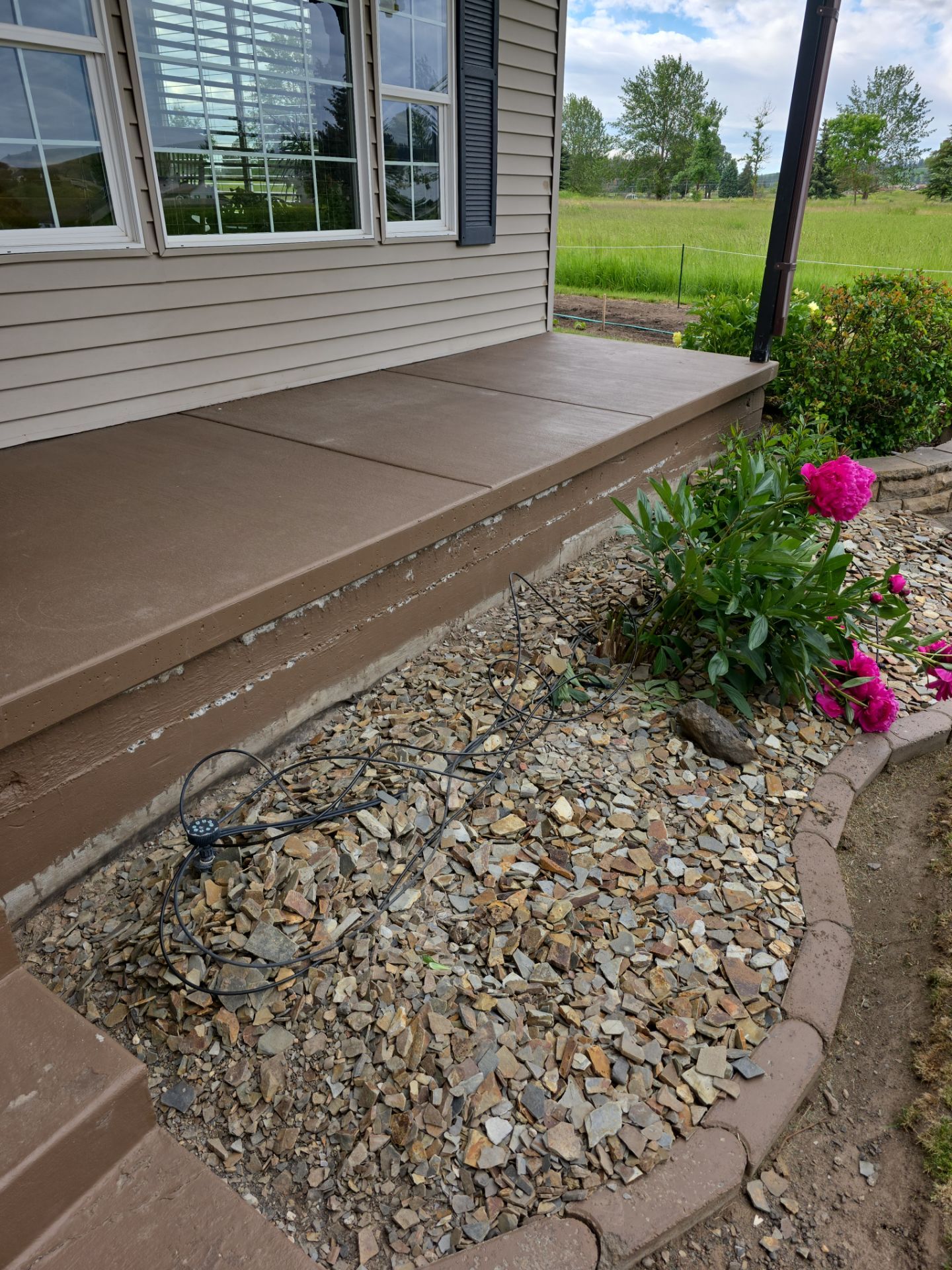 Concrete Patio and Walkway Coating Transformation in Cheney by Croc Coatings, LLC