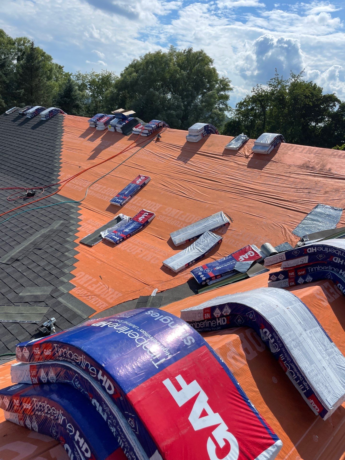 Residential Roofing Installation using GAF Timberline HDZ Charcoal by Rainstoppers Roofing