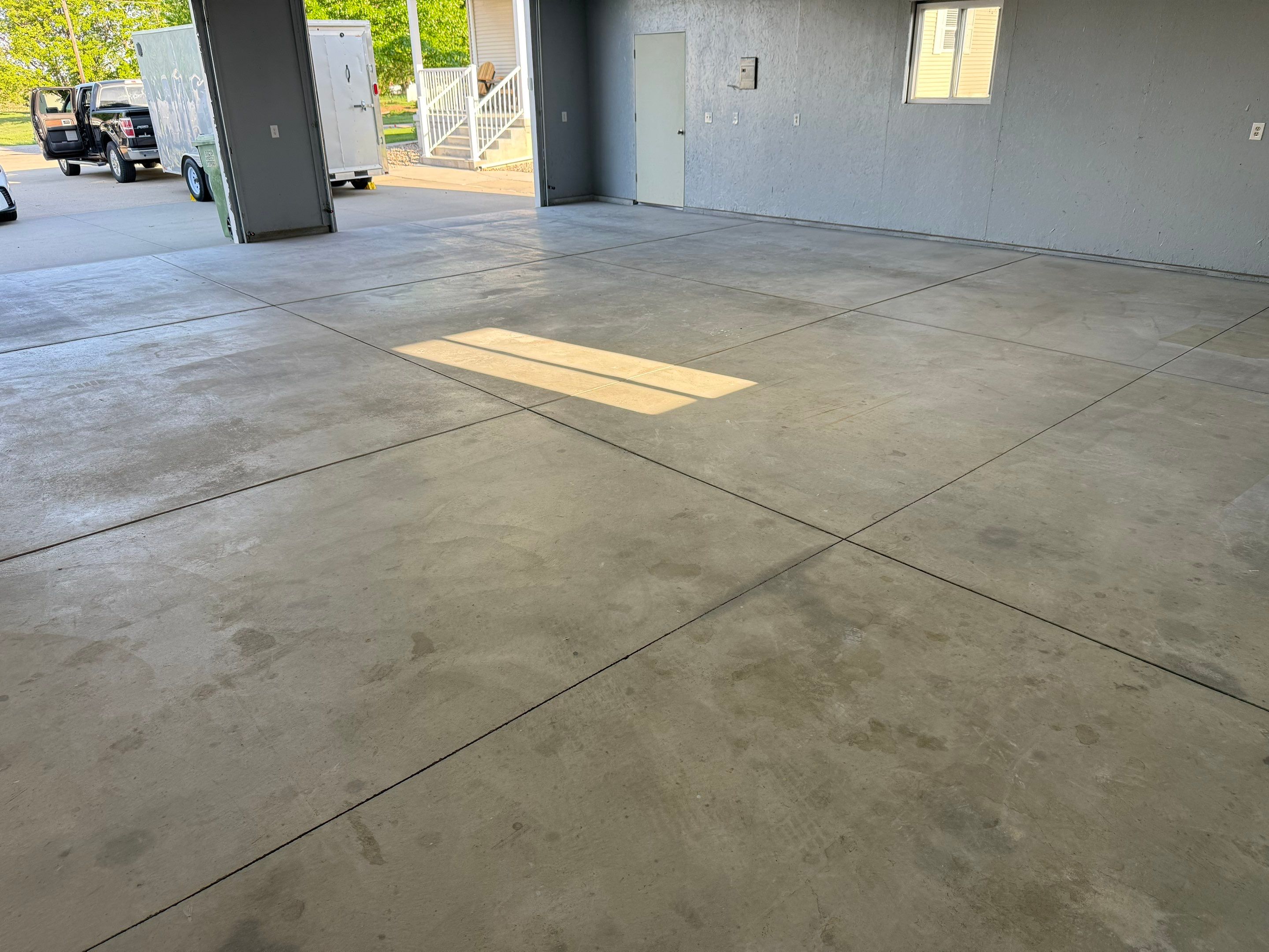 Four-Stall Garage Epoxy Floor Coating in Hampton by Goat Coatings
