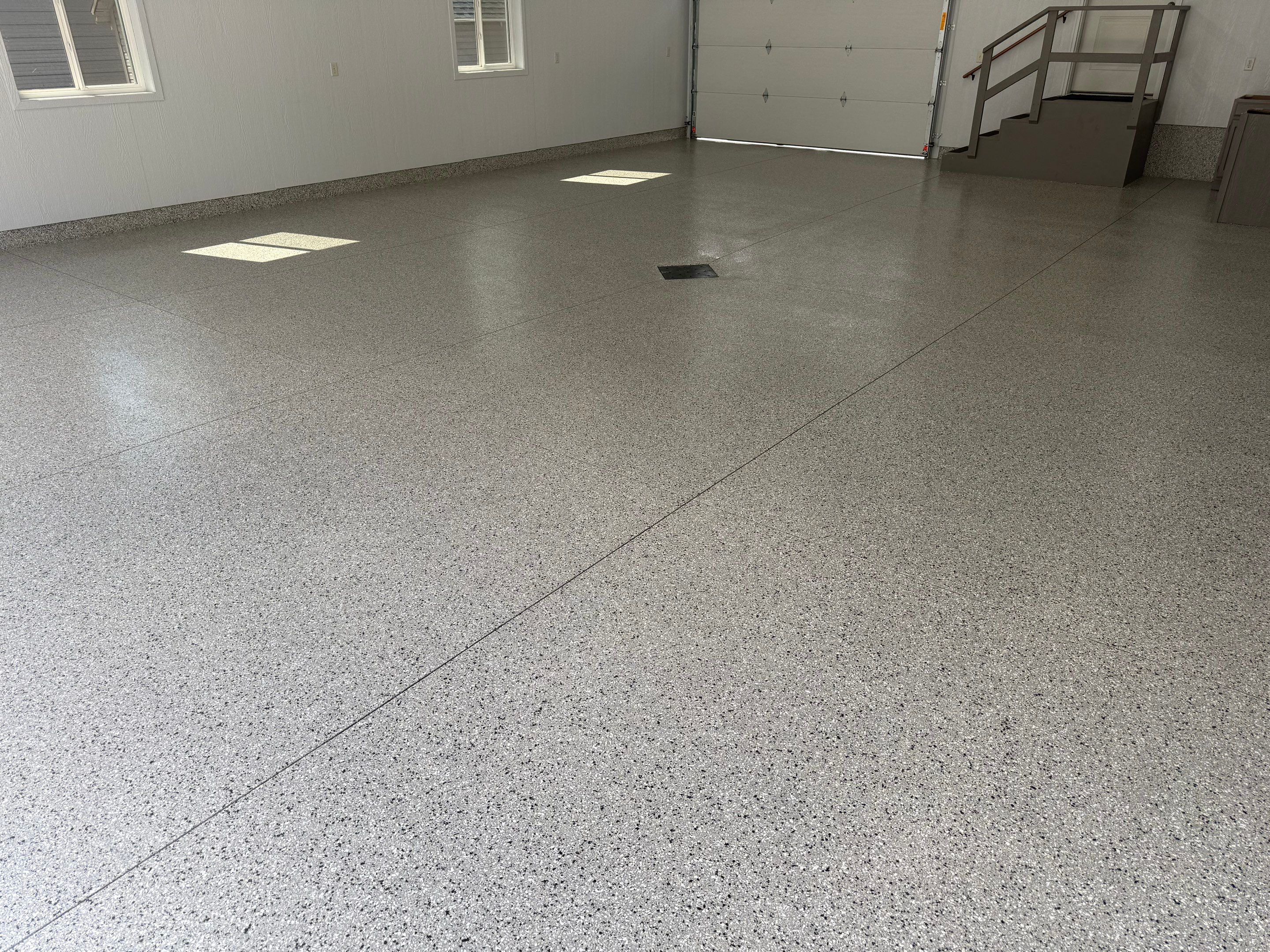 Speckled Epoxy Concrete Coating for Edgerton Garage Floor by Select Painting, Coatings & Garage Cabinets