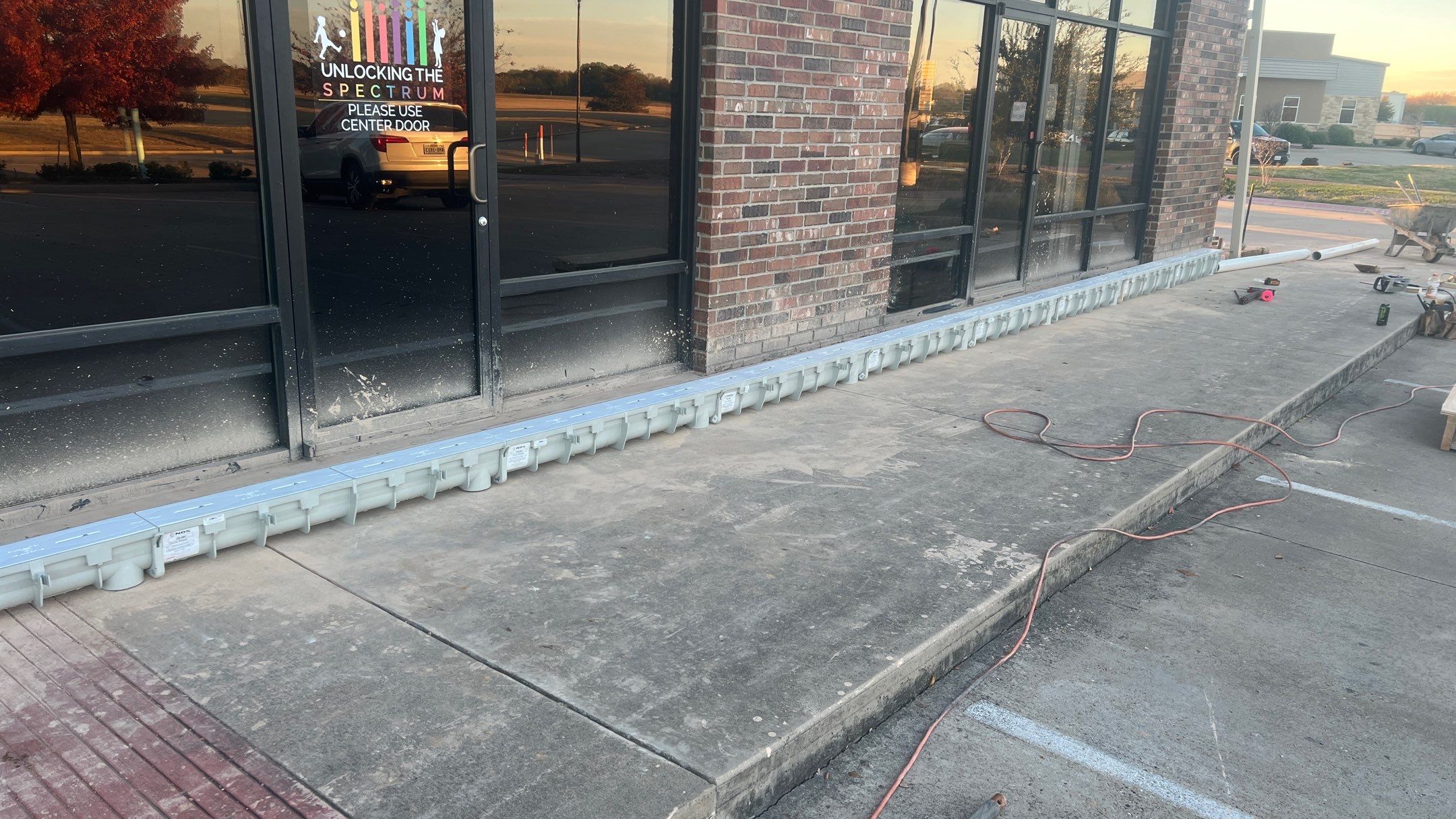 Drainage System Installation and Metal Roof Repairs by Harvey Roofing & Construction
